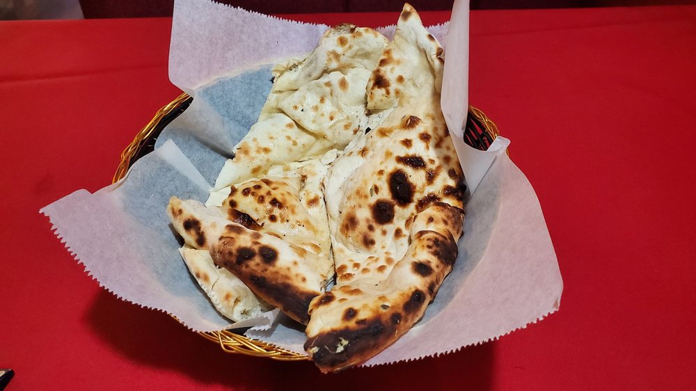 Order  Plain Naan food online from Himalayan Restaurant store, San Diego on bringmethat.com