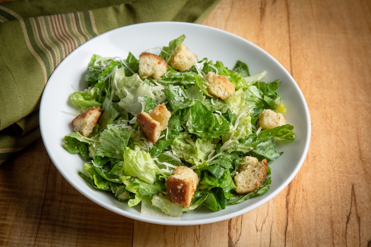 Order Caesar Side Salad food online from Uno Chicago Grill store, Maple Shade Township on bringmethat.com
