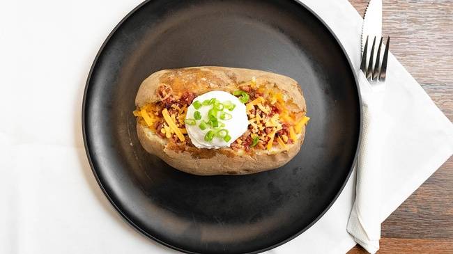 Order Full Loaded Potato food online from Hightower Cafe store, Houston on bringmethat.com