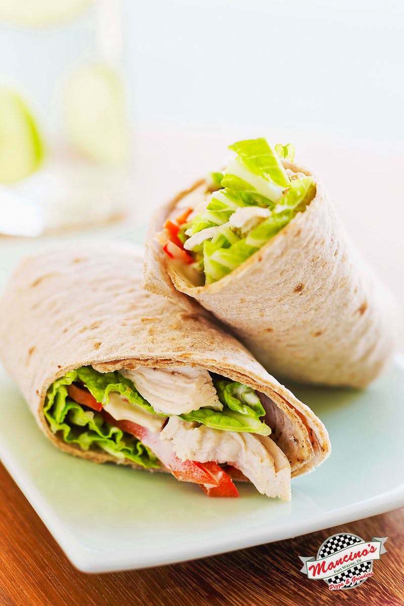 Order Ranch Chicken Wrap - Wrap food online from Mancino Grinders & Pizza store, New Haven on bringmethat.com