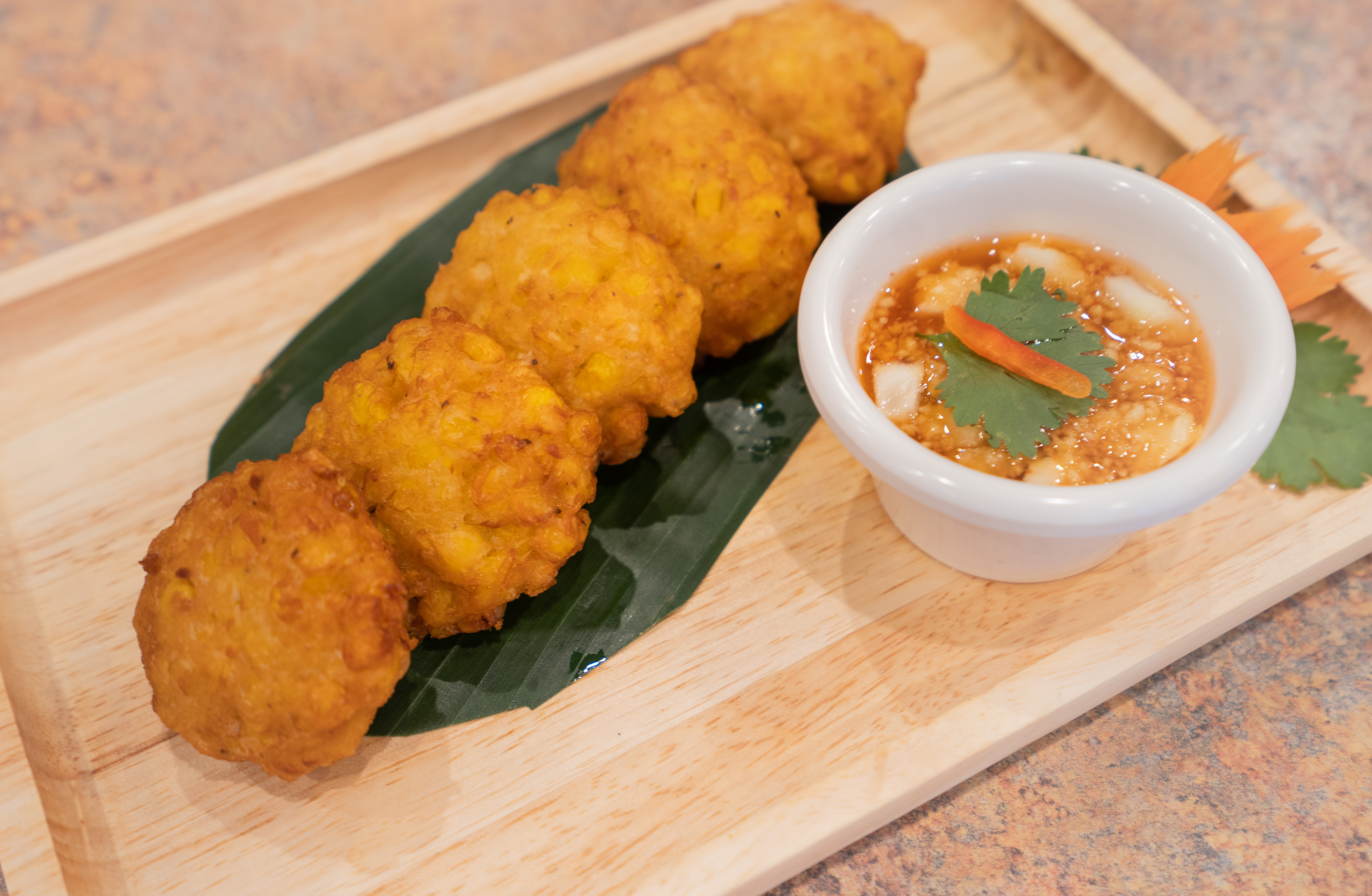 Order 5 Thai Corn Cakes food online from Iyara Thai Cuisine store, Houston on bringmethat.com