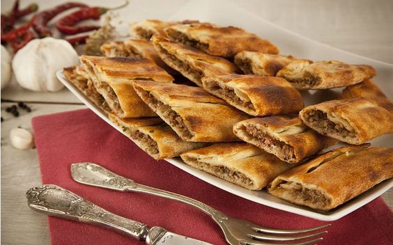 Order Ground Beef and Cheese Pide food online from Magic Bites Bakery store, Arlington on bringmethat.com