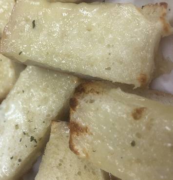 Order Garlic Cheese Bread food online from Amighetti Late Night store, St. Louis on bringmethat.com