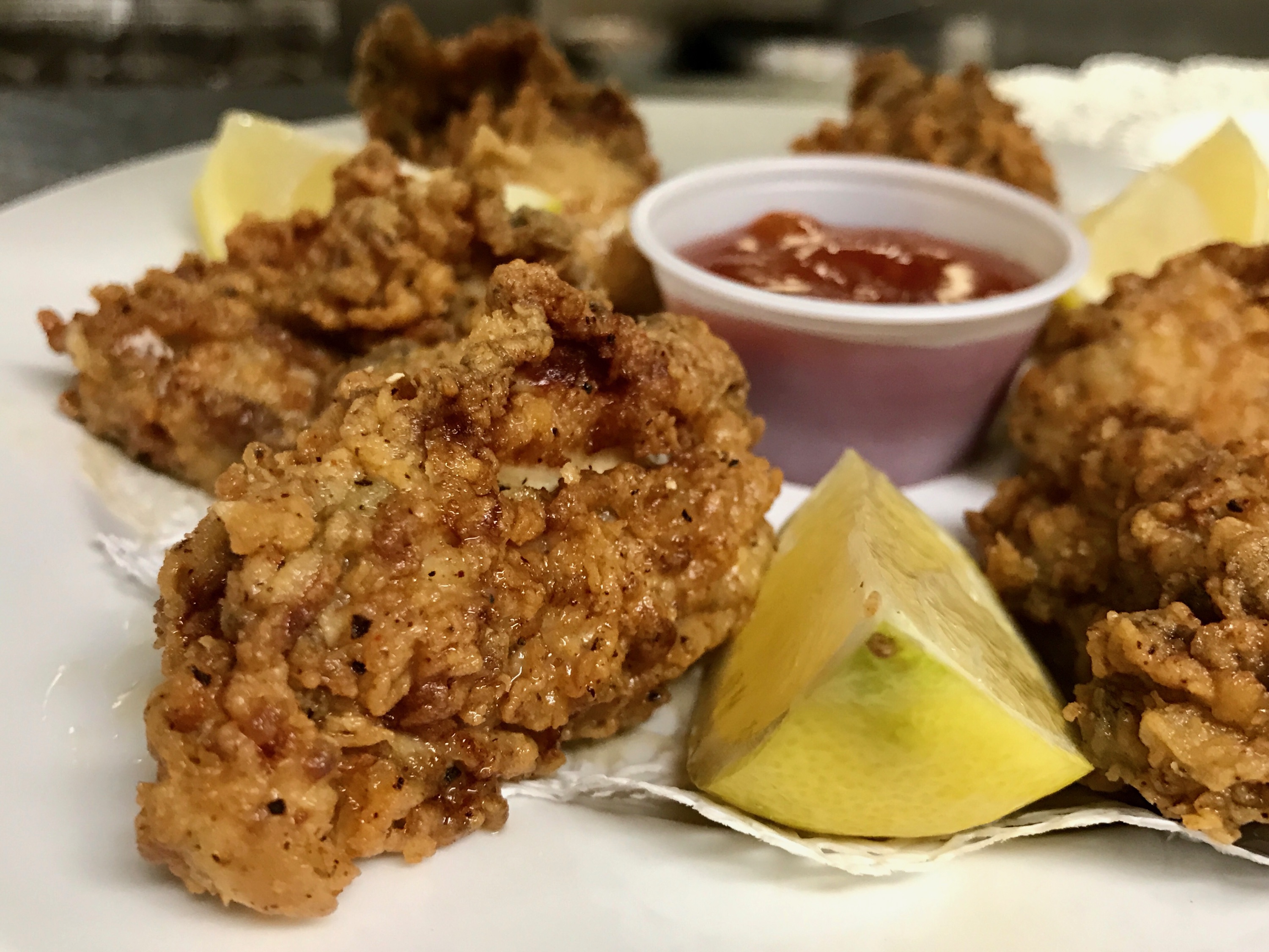 Order Fried Oysters food online from Ragin Cajun Cafe store, Redondo Beach on bringmethat.com