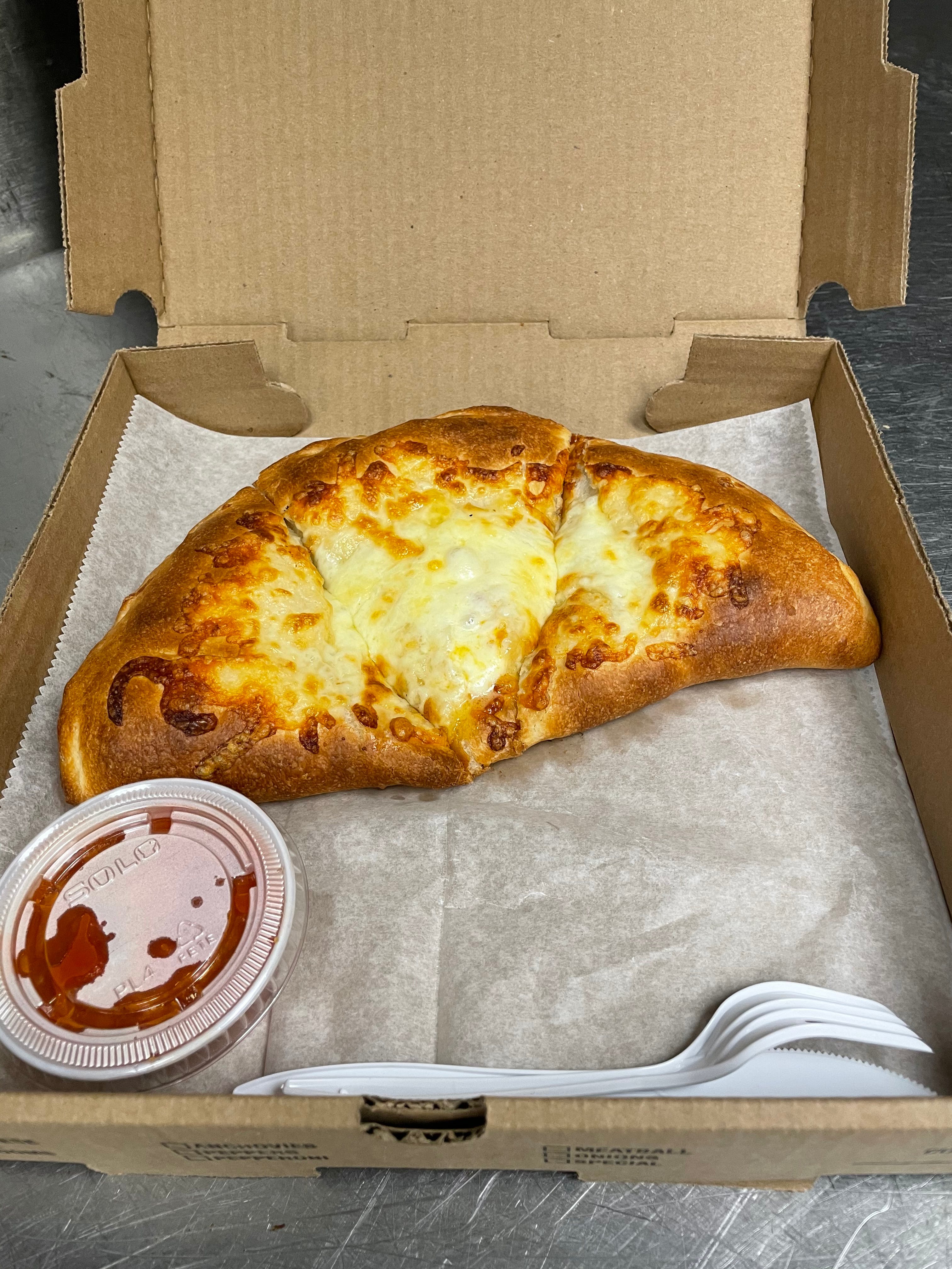 Order Cheese Stromboli - Small food online from West Broadway Pizza & Seafood store, Gardner on bringmethat.com