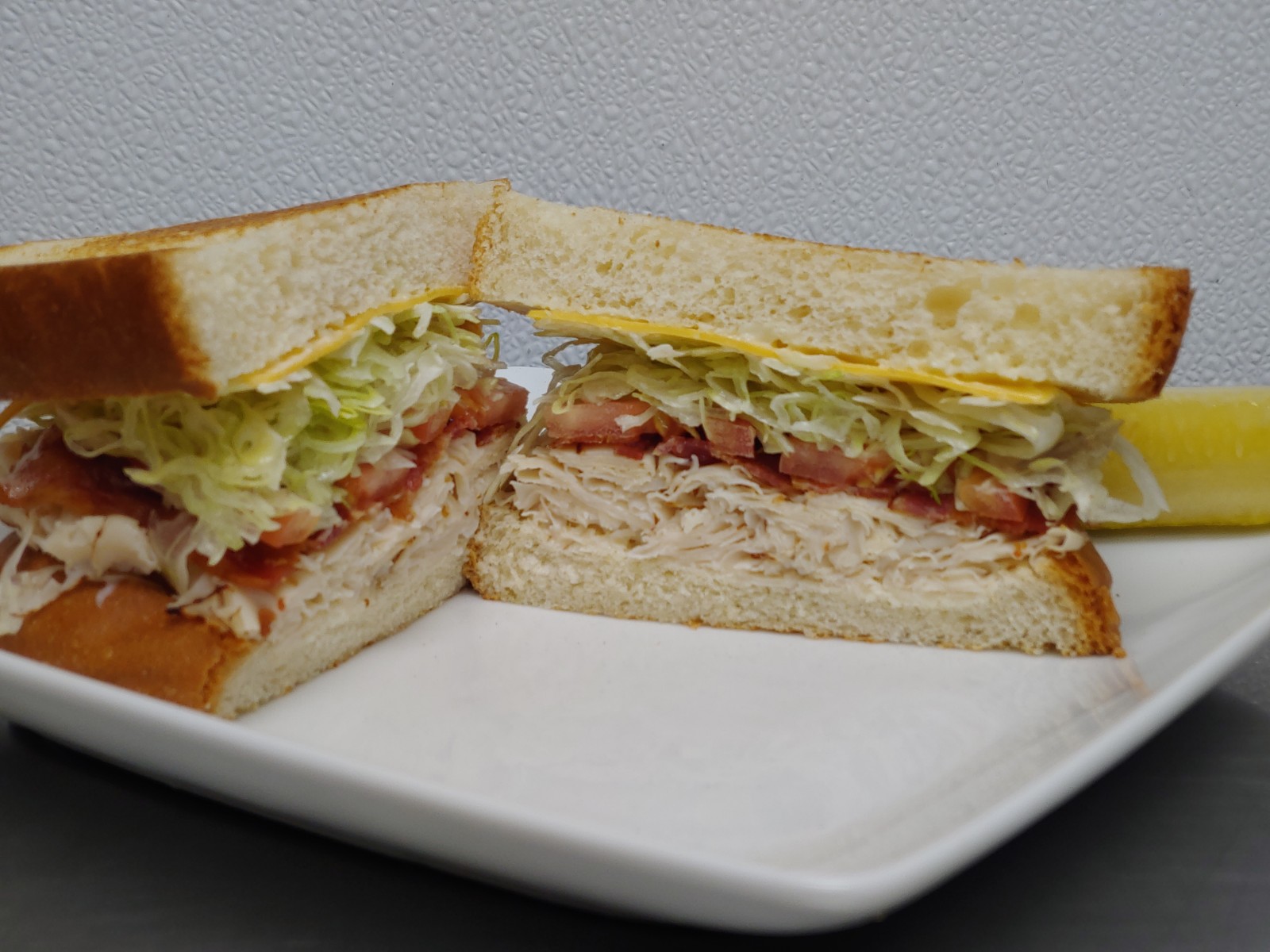 Order 16. The Club Sandwich food online from Amazing Deli store, Midland on bringmethat.com