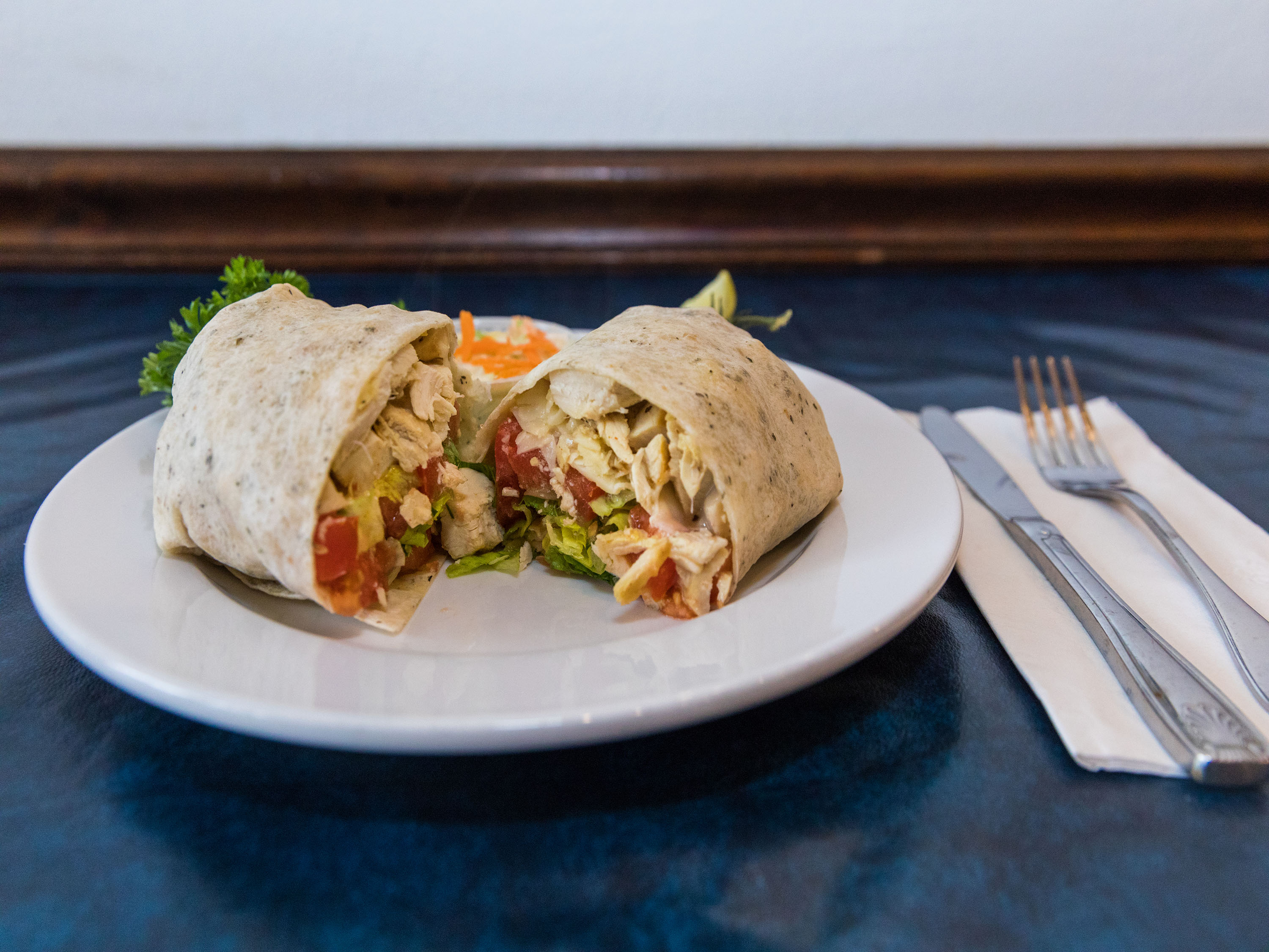 Order Chicken Caesar Wrap food online from Bluffington Cafe store, Lake Bluff on bringmethat.com