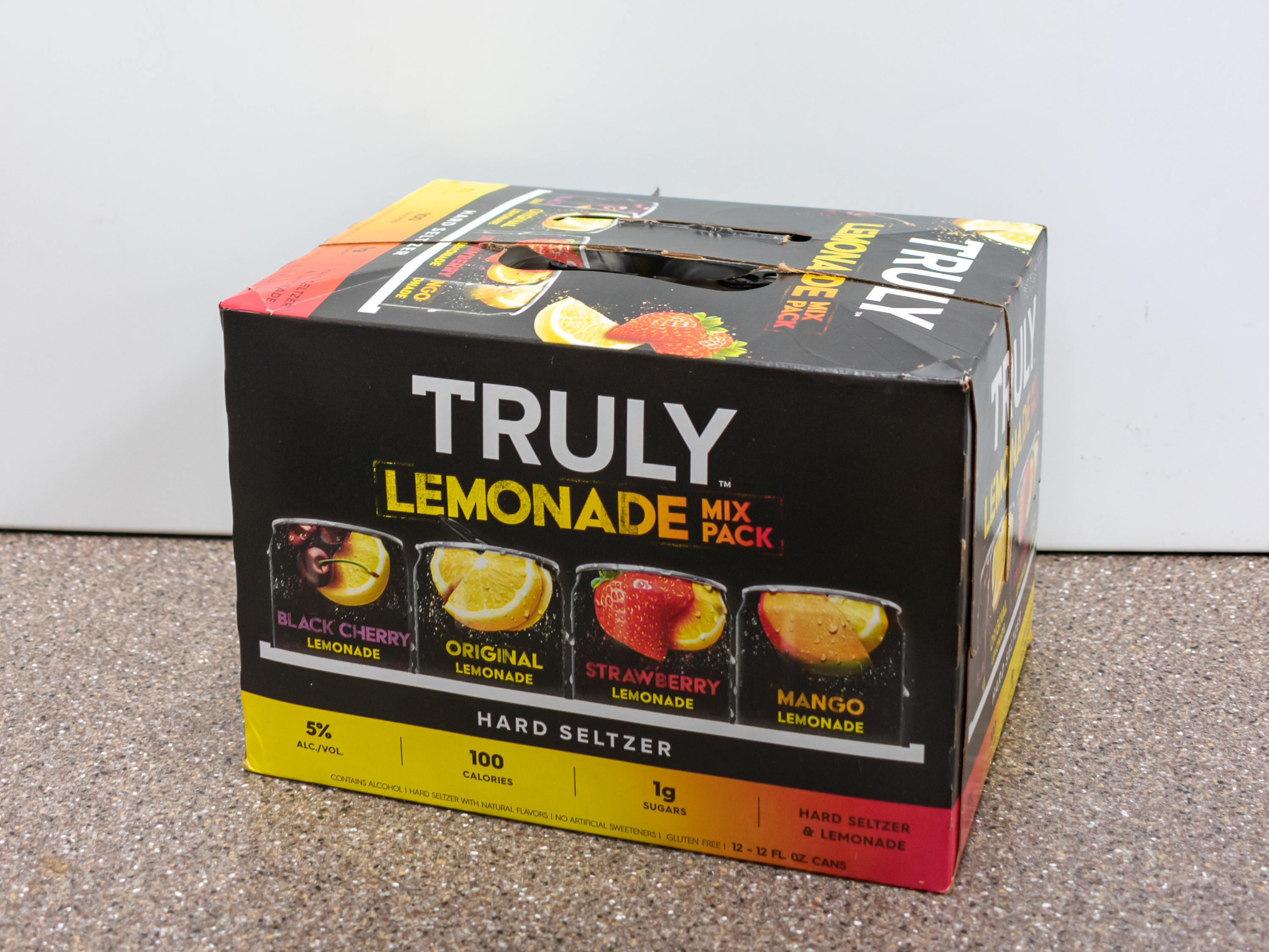 Order Truly Lemonade Hard Seltzer Mix Pack Spiked & Sparkling Water, 12 oz. Can - 12 Pack food online from Kangaroo Food Mart store, Cathedral City on bringmethat.com
