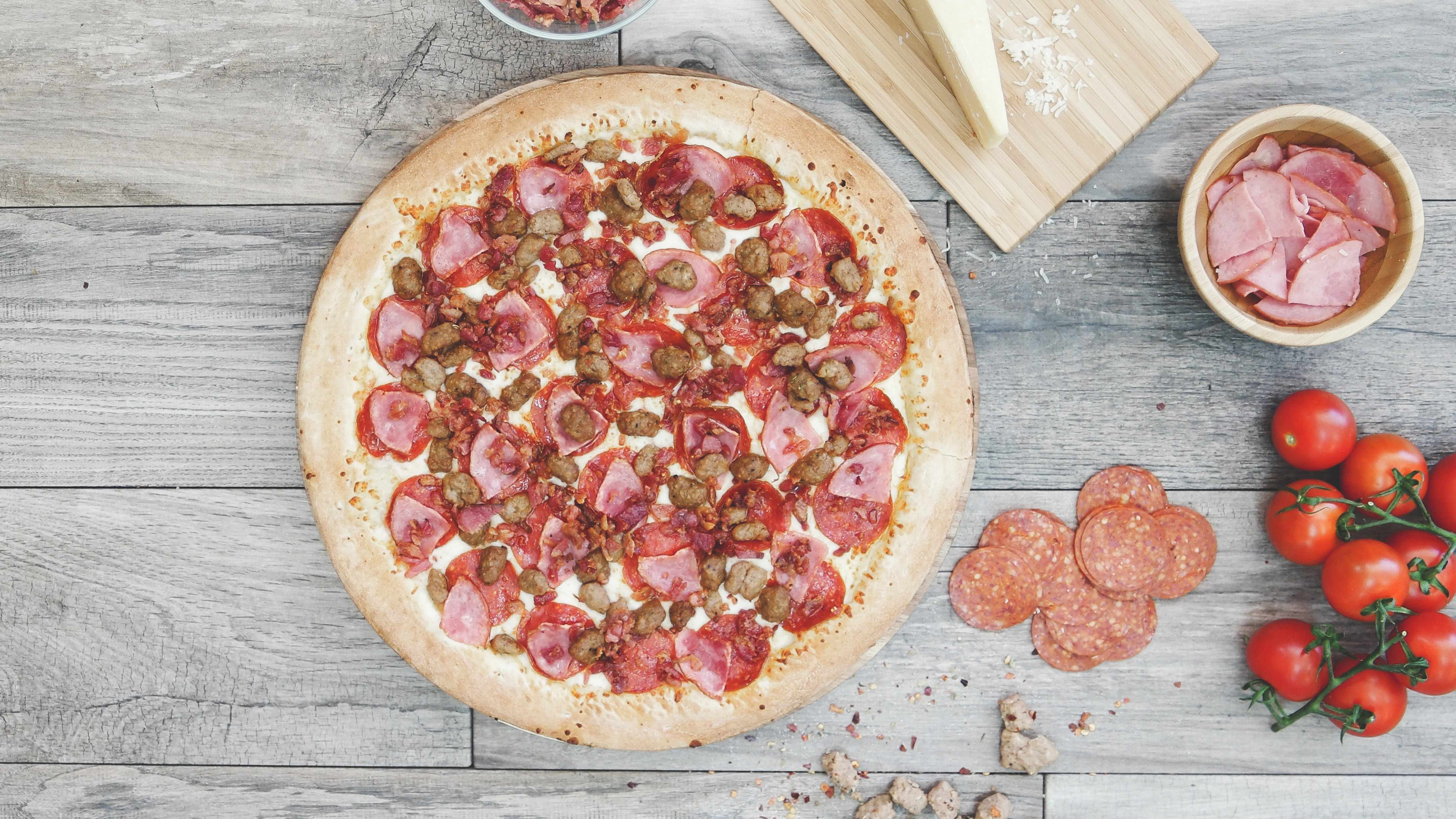 Order Meat Lover's Pizza food online from Fast 5 Pizza store, Riverside on bringmethat.com