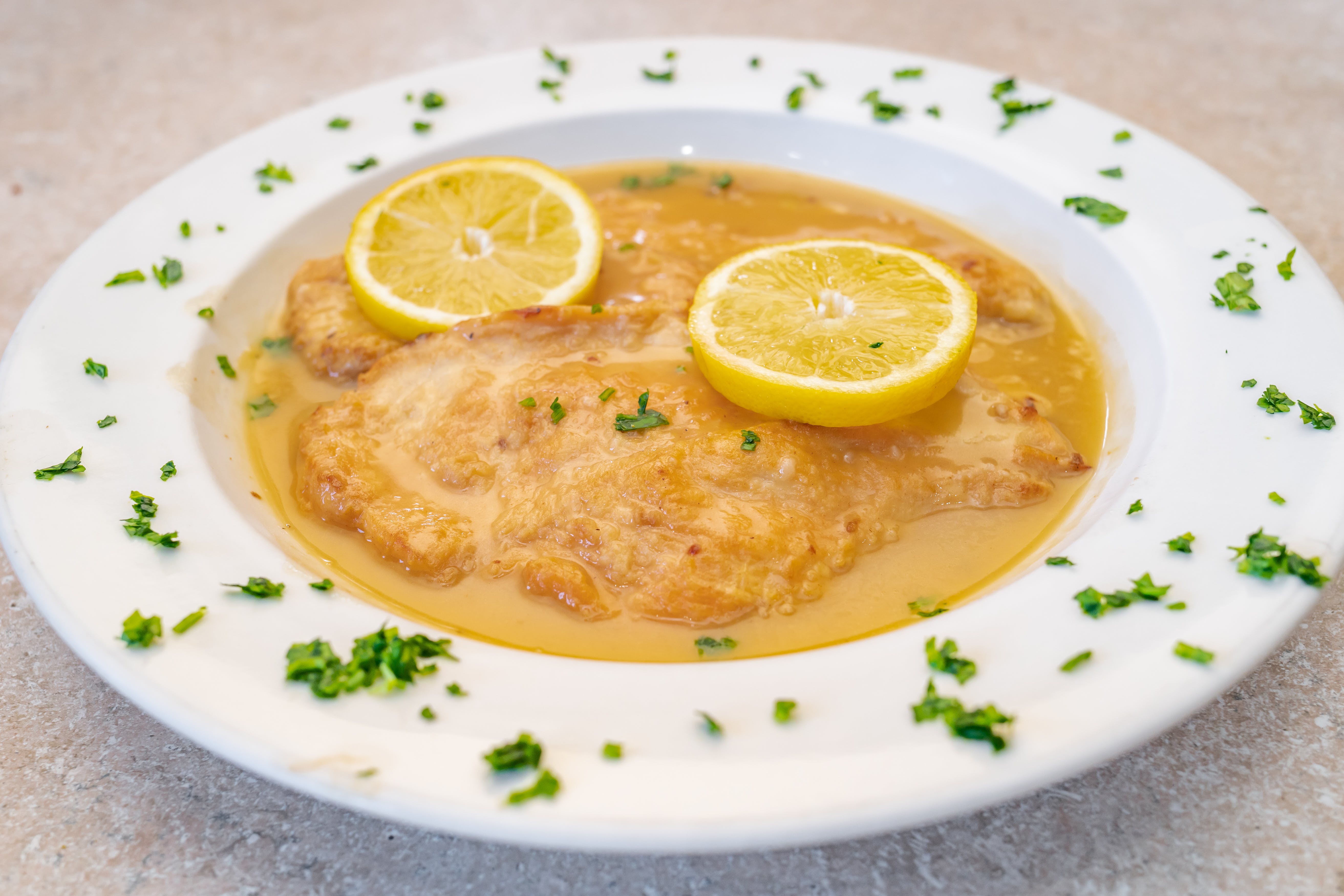 Order Chicken Francese - Entree food online from Bella Pizza store, Springfield Gardens on bringmethat.com