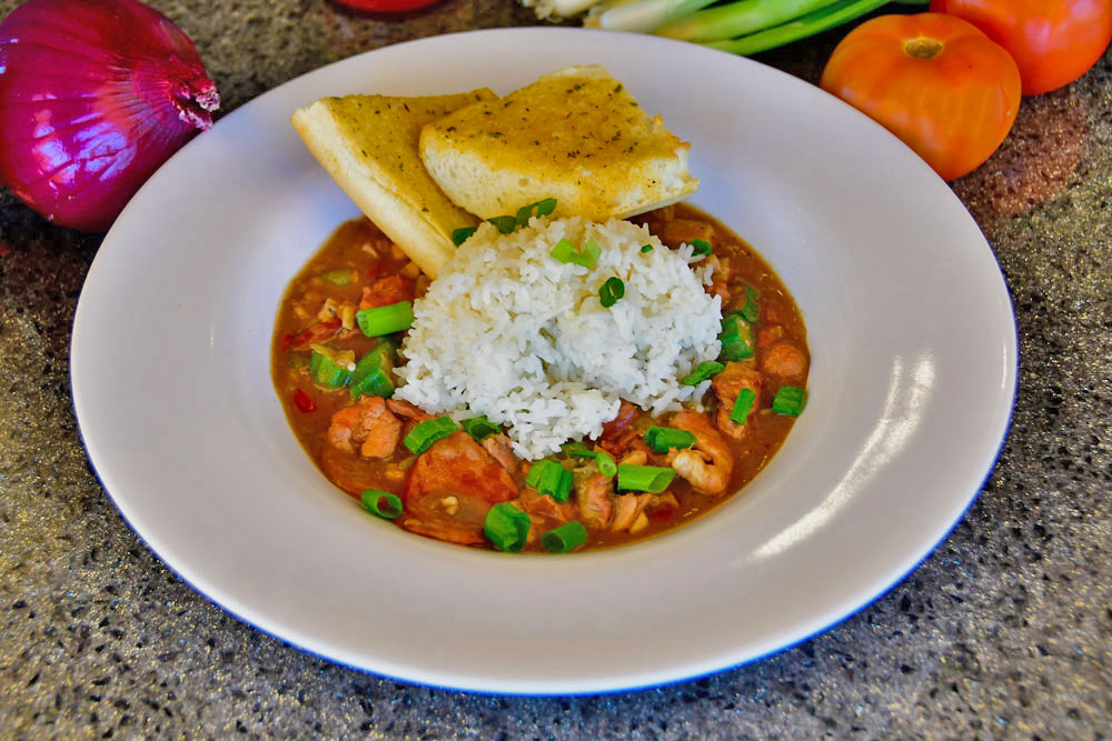 Order Lunch Gumbo food online from Voodoo Daddy Steam Kitchen store, Tempe on bringmethat.com