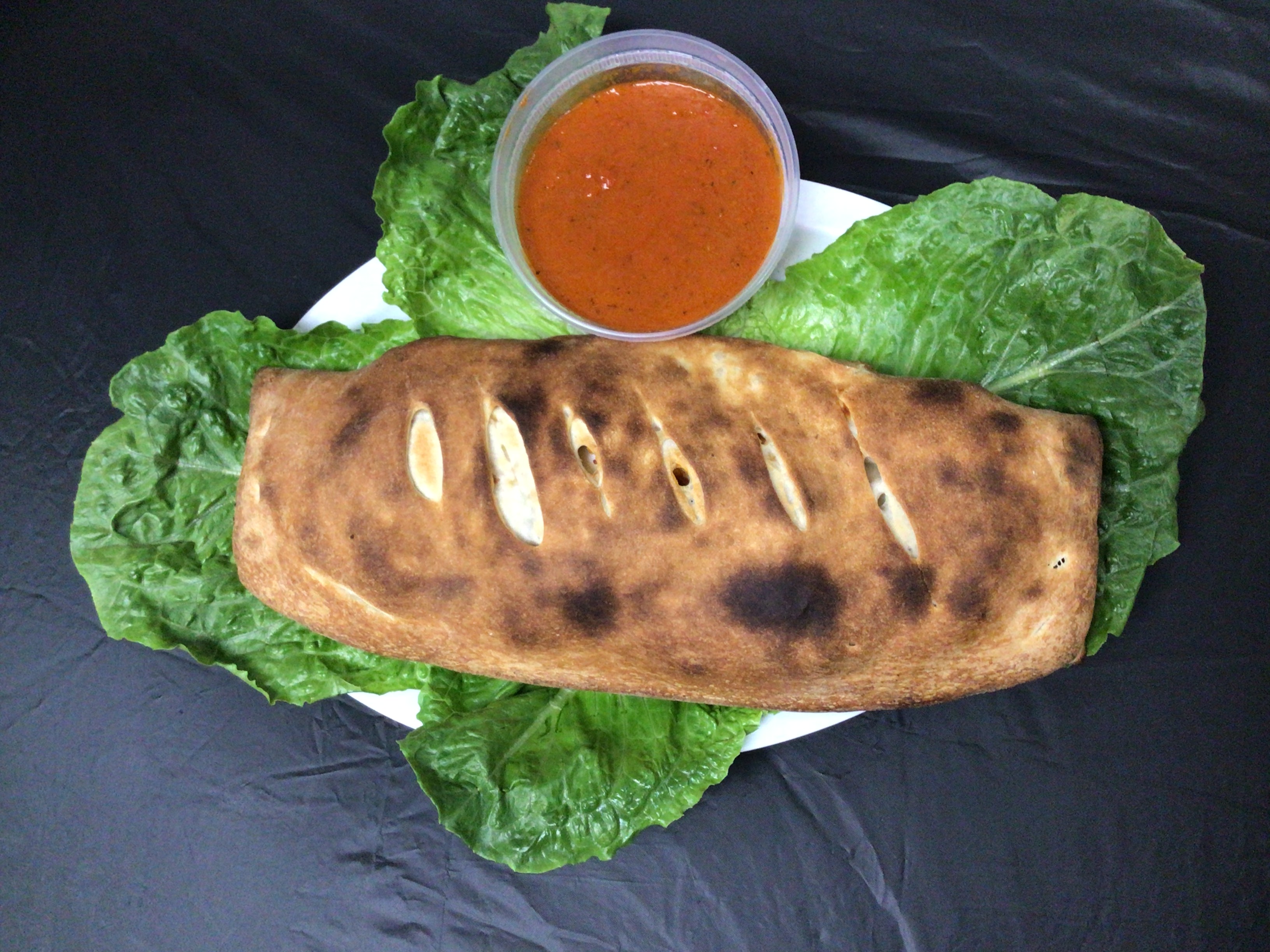 Order Pepperoni Stromboli food online from Panchos Pizza store, Milford on bringmethat.com