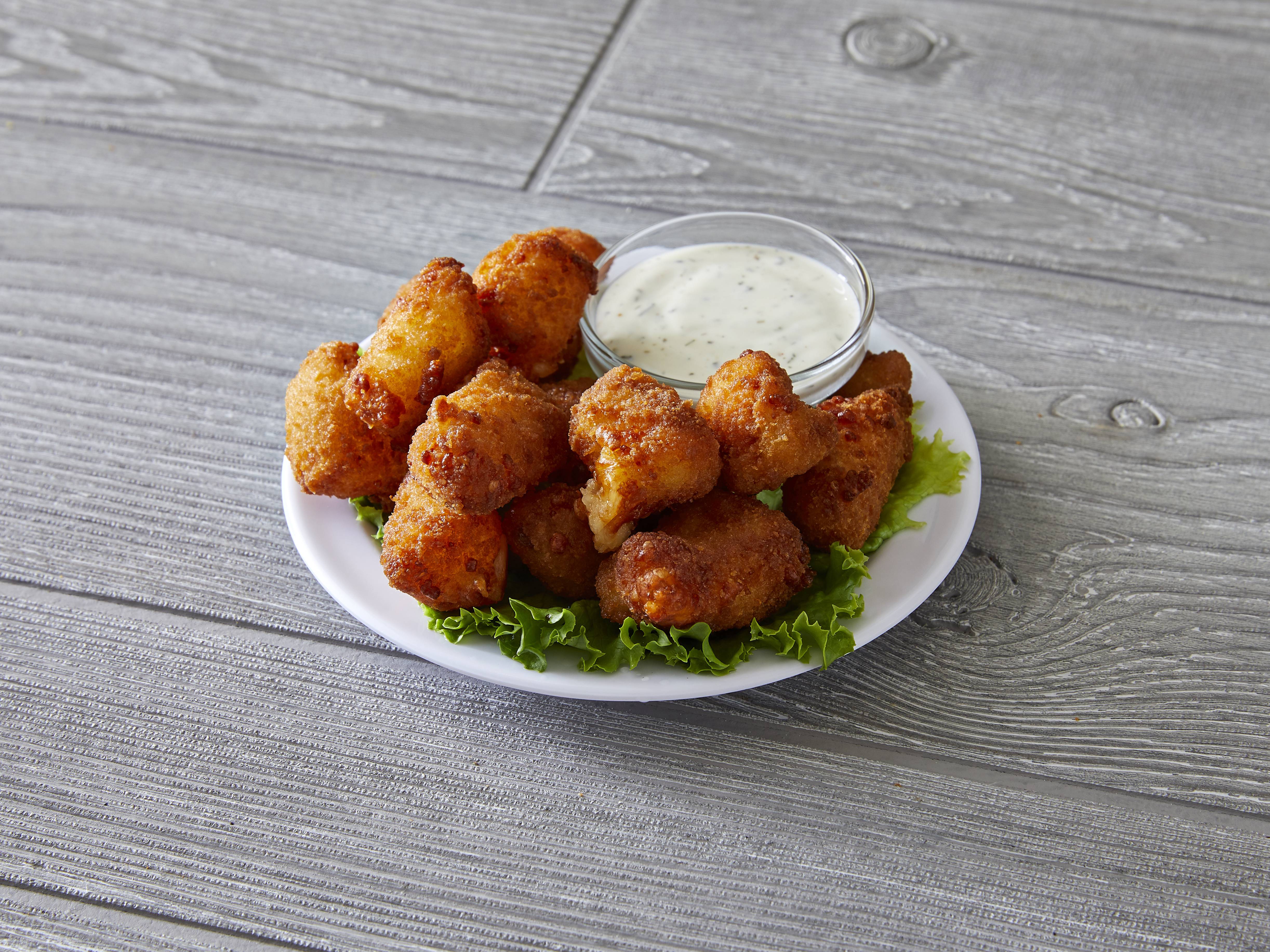Order Wisconsin Cheese Curds food online from Paternos Pizza store, Chicago on bringmethat.com