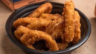 Order REG ONION RINGS food online from Pete's Chicken-N-More - South Port store, Corpus Christi on bringmethat.com