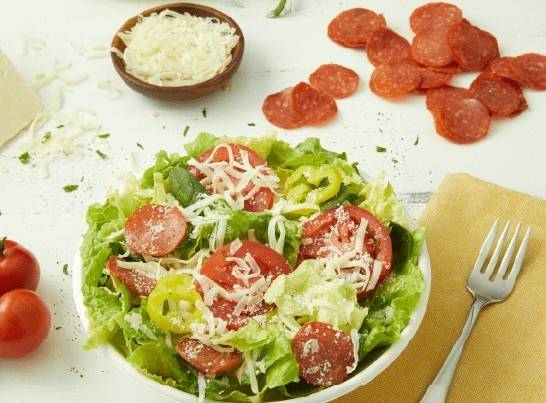 Order Italian Side Salad food online from Donatos Pizza -1710 State Rd store, CUYAHOGA FALLS on bringmethat.com