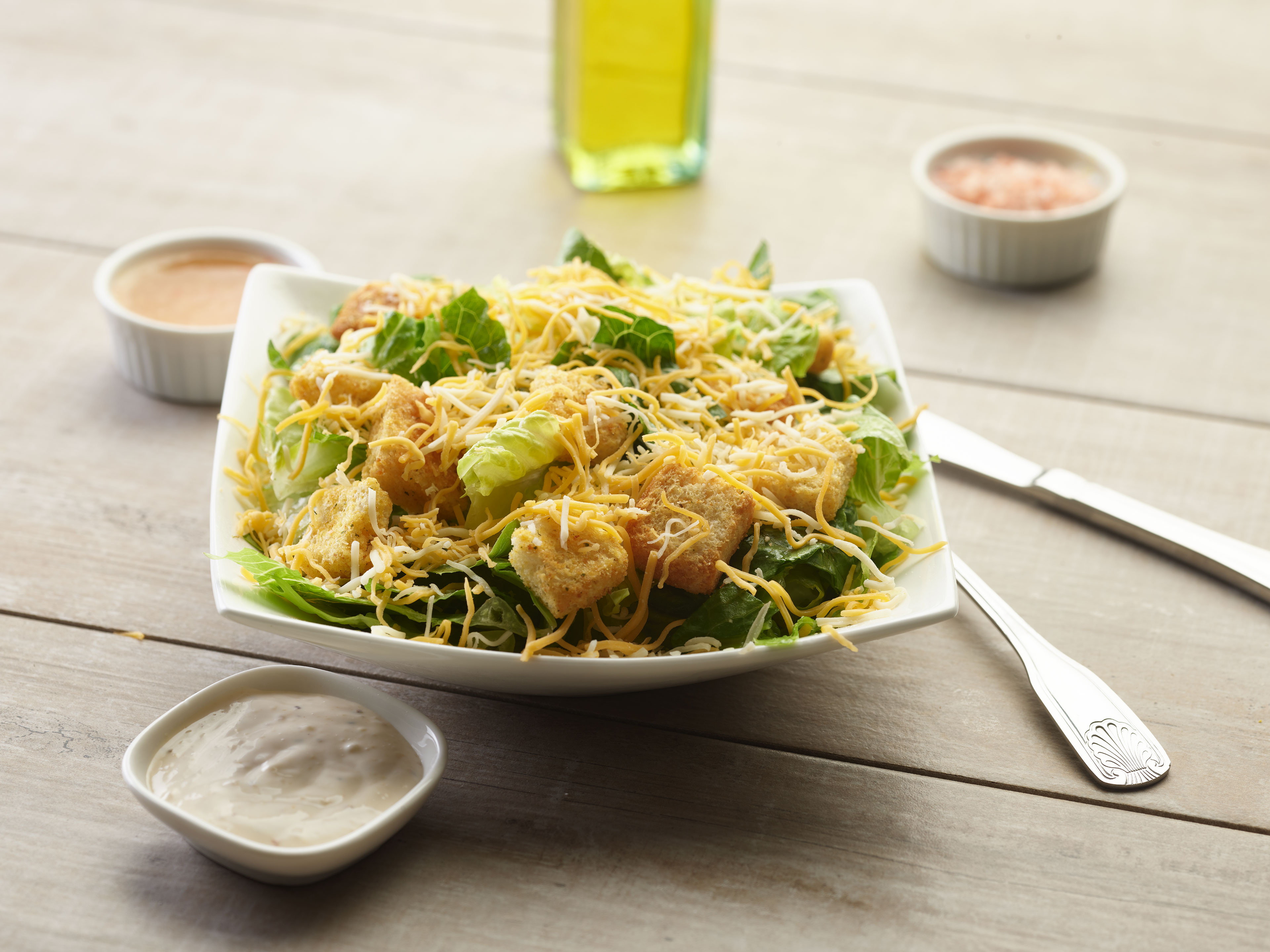 Order Caesar Salad food online from Pizza Twist store, Fairfield on bringmethat.com