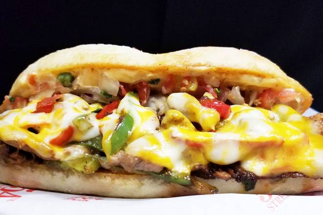 Order CAJUN BEEF PHILLY food online from 54th Street Grill & Bar - store, Kansas City on bringmethat.com