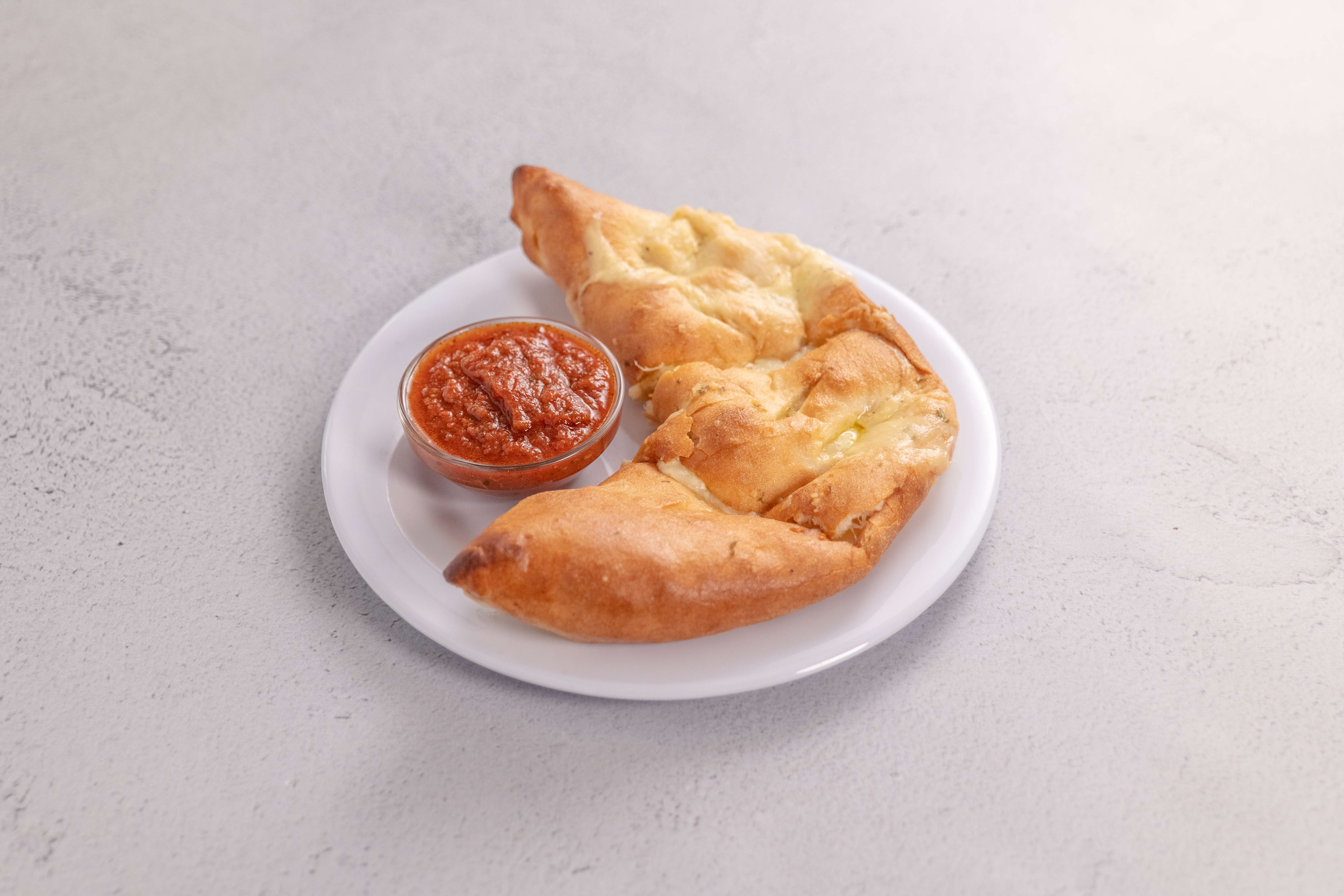Order Calzone food online from Tony Pizza store, San Fernando on bringmethat.com
