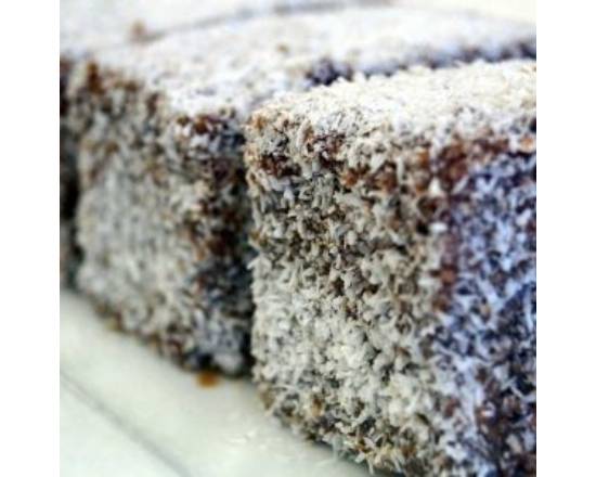 Order Coconut Bars White Cake food online from Davis Bakery And Delicatessen store, Warrensville Heights on bringmethat.com