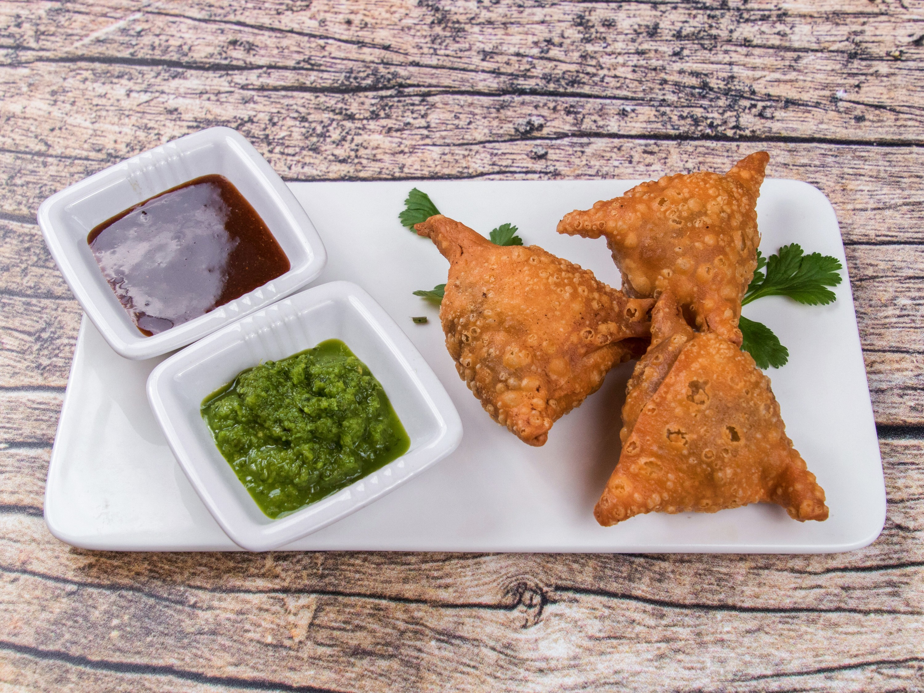 Order Chicken Samosa (2 pieces) food online from Royal Sweets store, Decatur on bringmethat.com