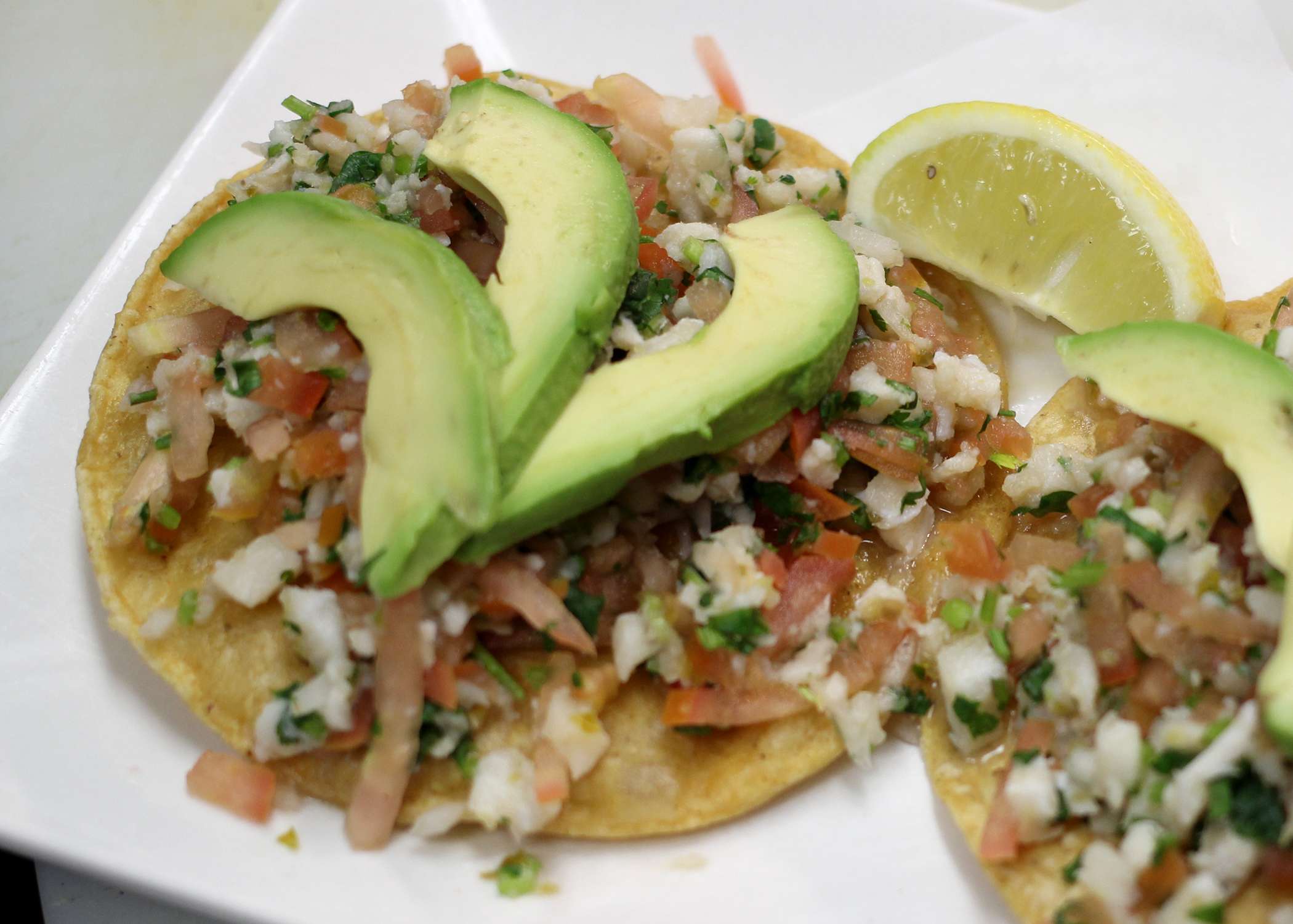 Order White Fish Ceviche Tostada food online from Bluesalt Fish Grill store, Redondo Beach on bringmethat.com