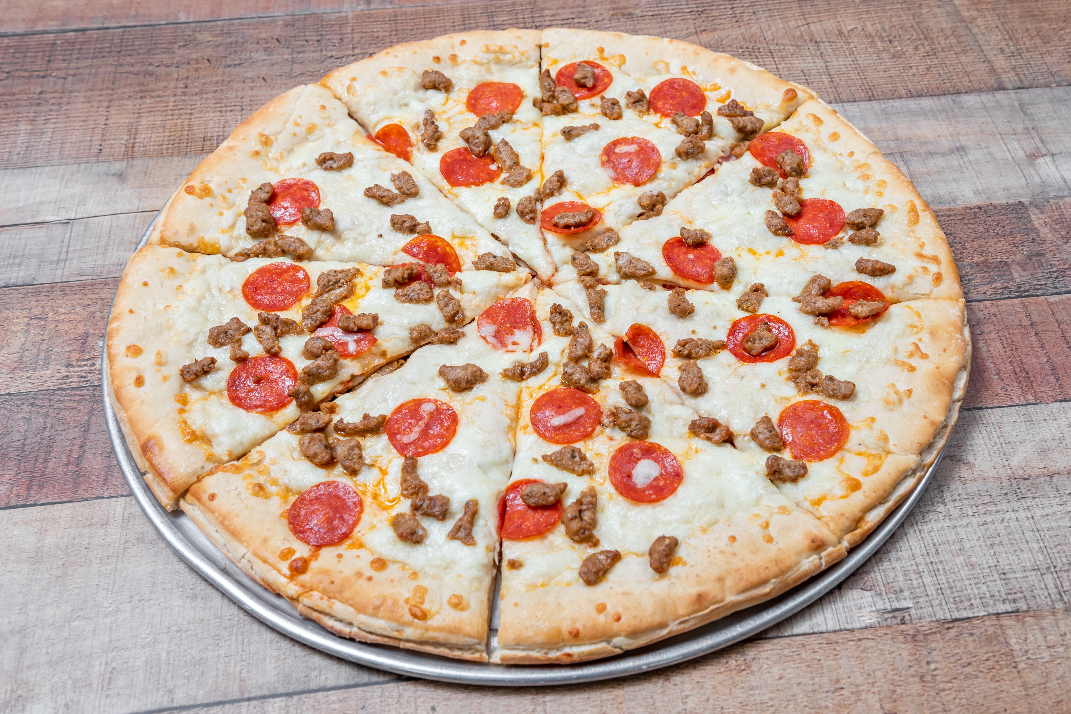 Order Stuffed Meat Lovers Pizza - Medium 14'' food online from Ray #1 Pizza store, Whitehall on bringmethat.com