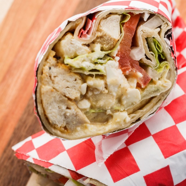 Order Greek Chicken Wrap food online from Bullchicks store, Baton Rouge on bringmethat.com