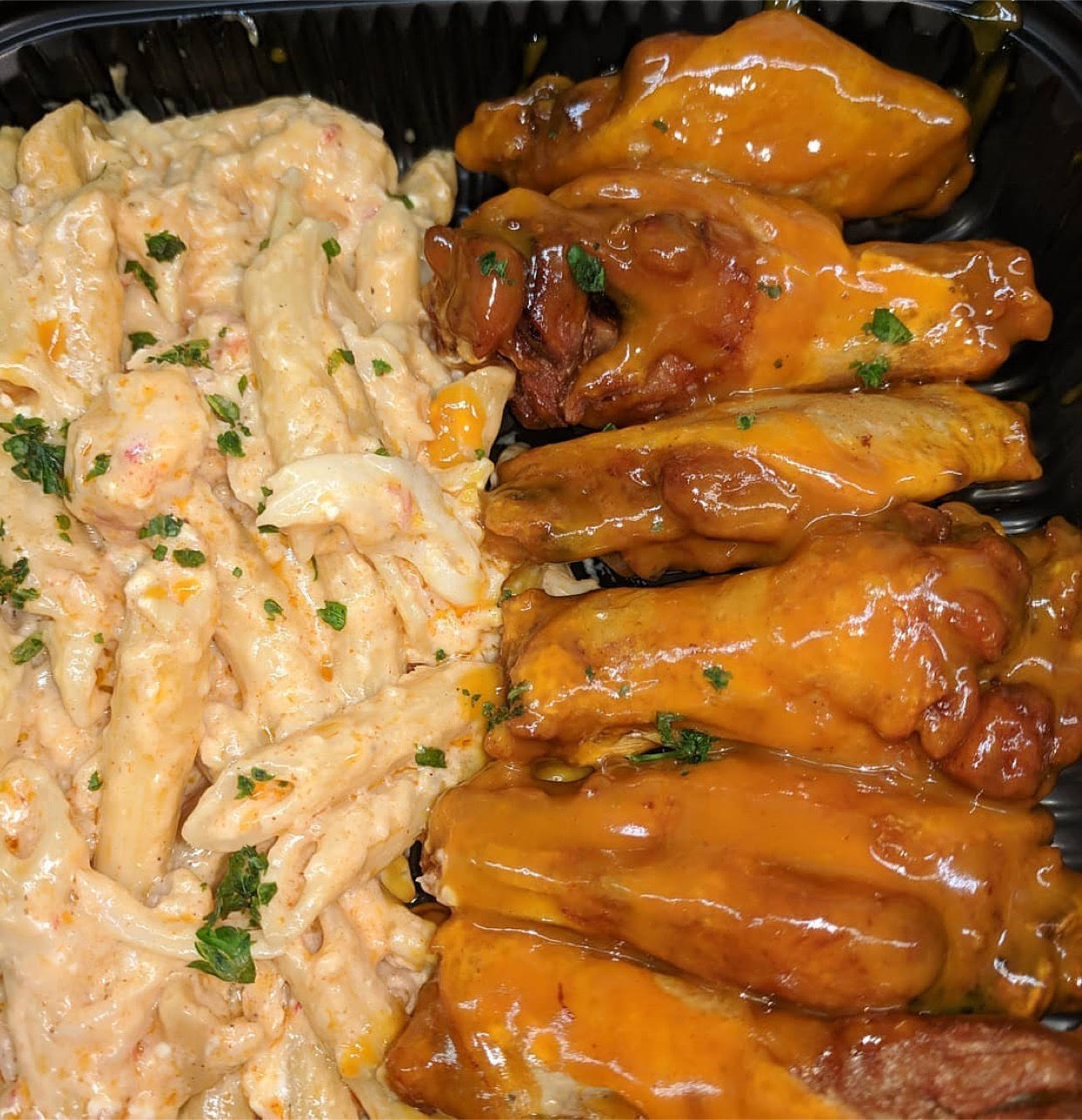 Order Wings & 1/2 Lobster Combo food online from Cuzzo's Cuisine store, Charlotte on bringmethat.com
