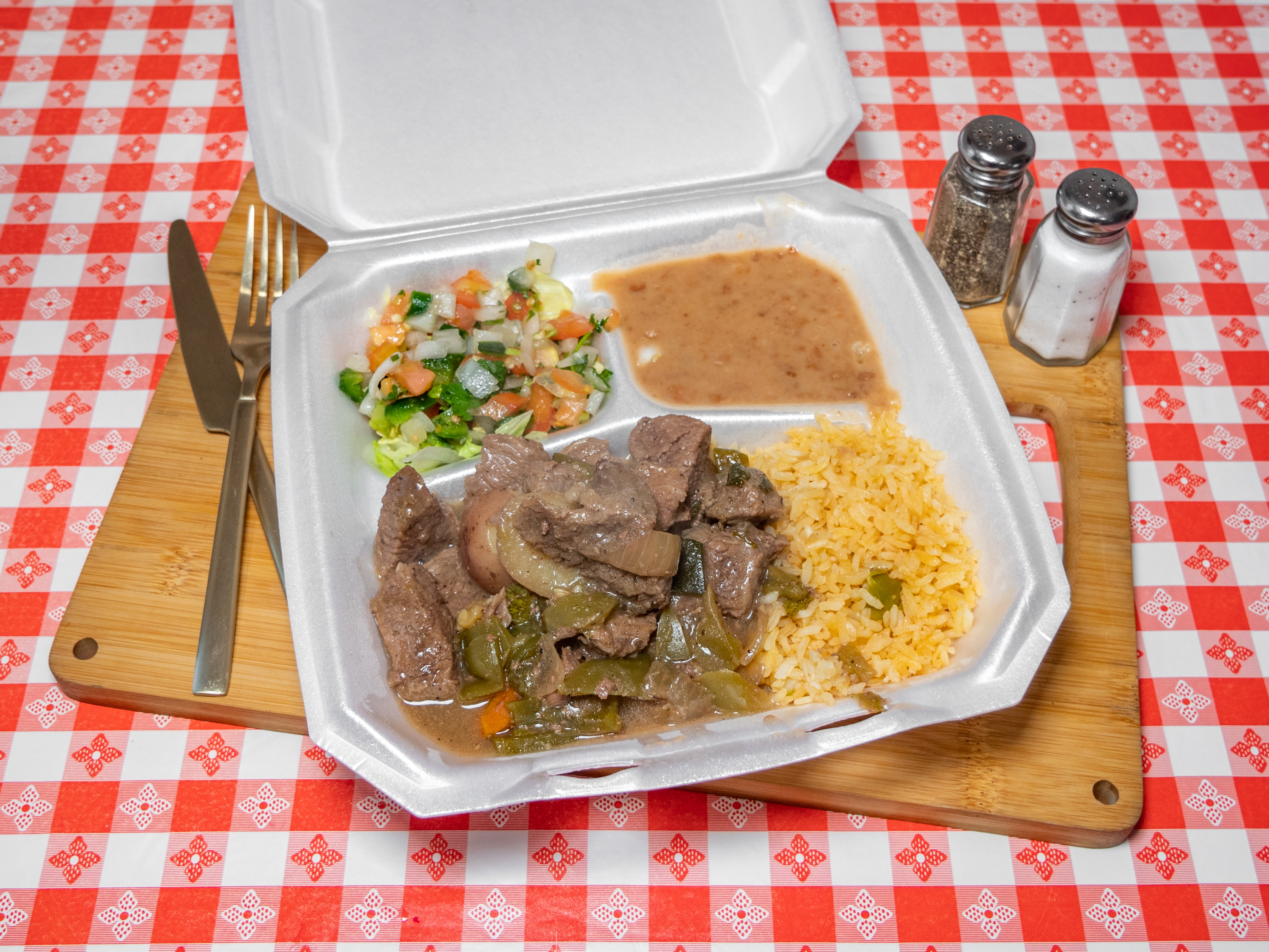 Order Carne Guisada food online from Tecate Mexican Restaurant store, Houston on bringmethat.com