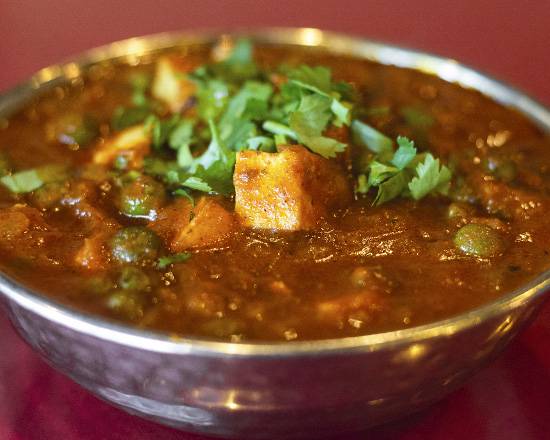 Order Mutter Paneer food online from Taj Indian Restaurant store, Nashville on bringmethat.com