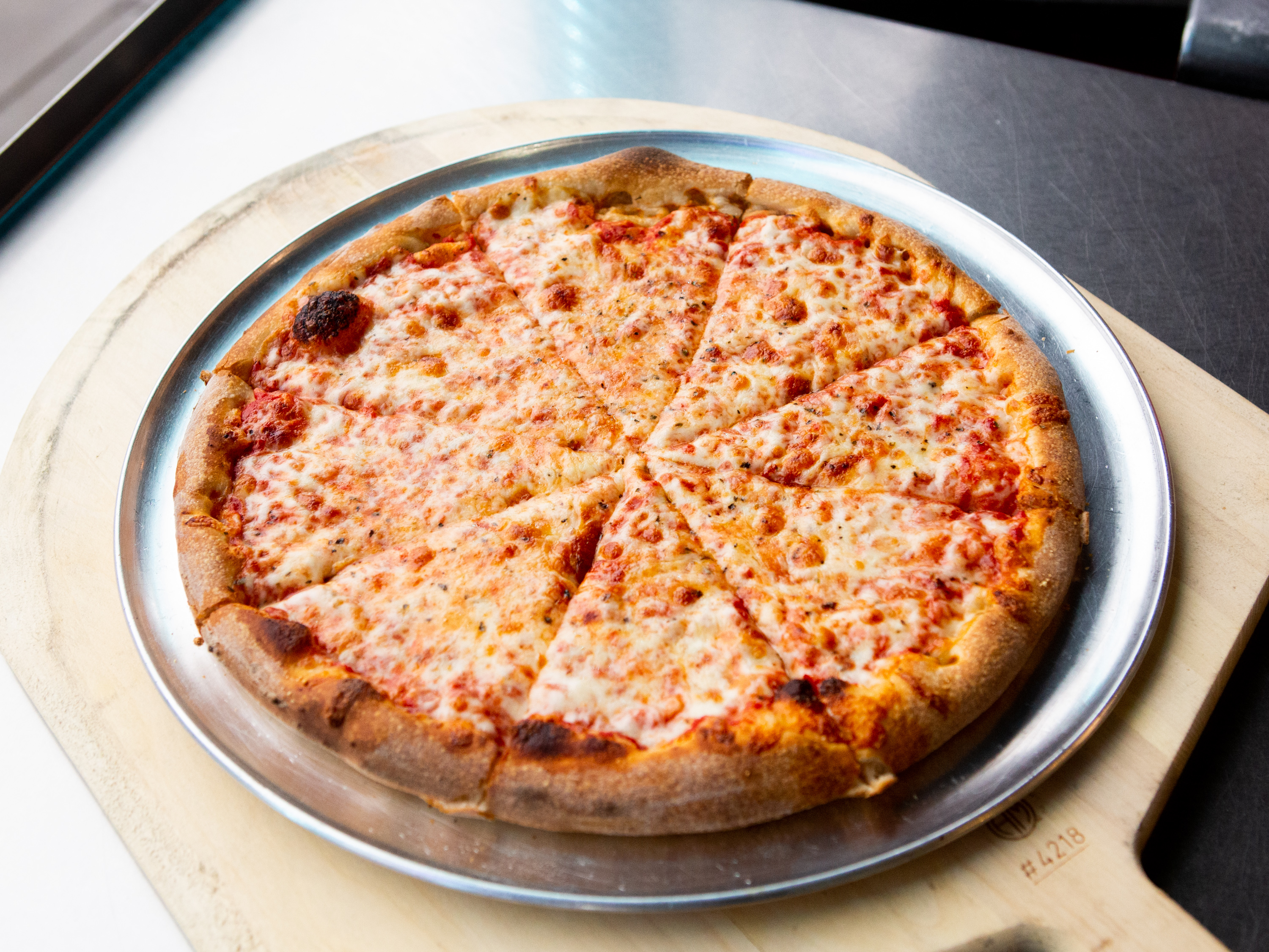 Order Hand Tossed Neapolitan Crust Cheese Pizza food online from Casa De Amici store, Morgantown on bringmethat.com