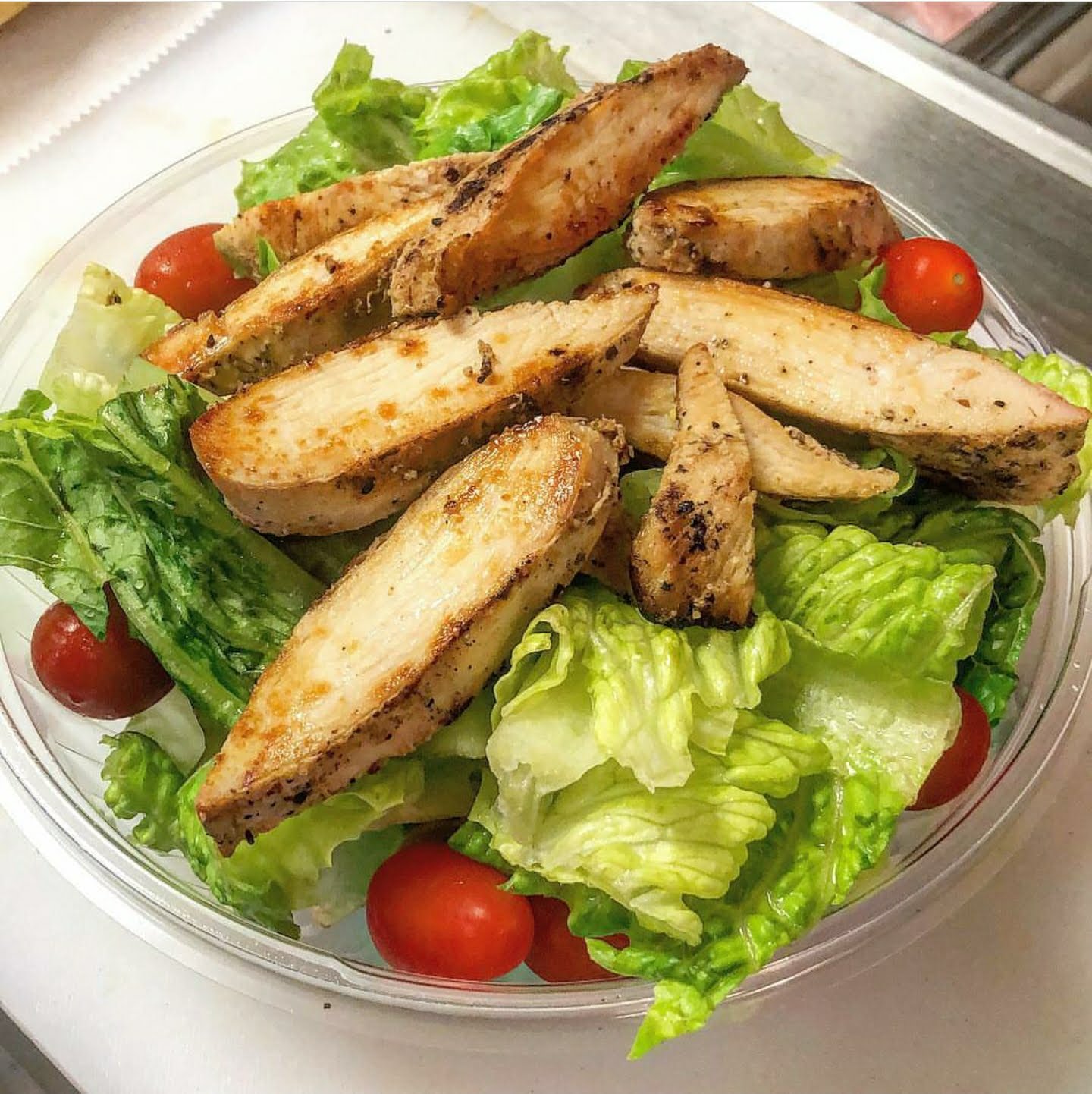 Order Grilled Chicken Caesar Salad food online from Bob Bagels store, Lyndhurst on bringmethat.com