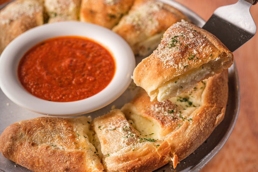 Order Calzone - Small food online from Pietros Italian store, Riverside on bringmethat.com