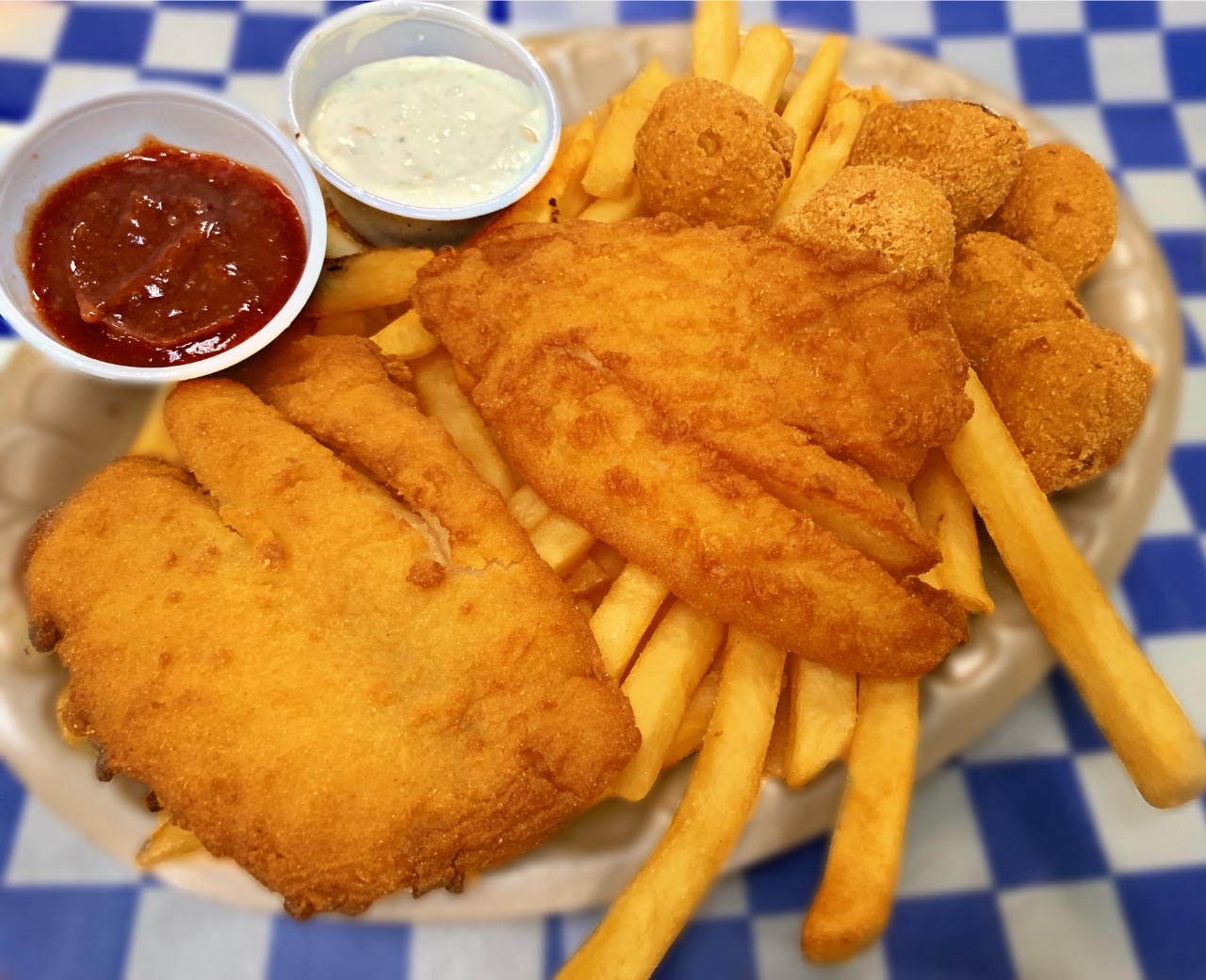 Order Fish Dinner food online from Village Pizza & Seafood store, Santa Fe on bringmethat.com