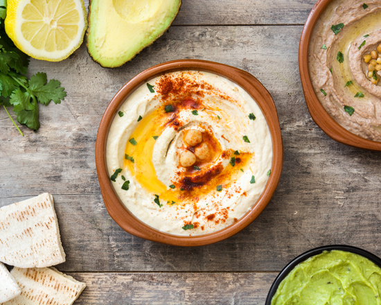 Order Hummus food online from The Gyro Spot store, New York on bringmethat.com