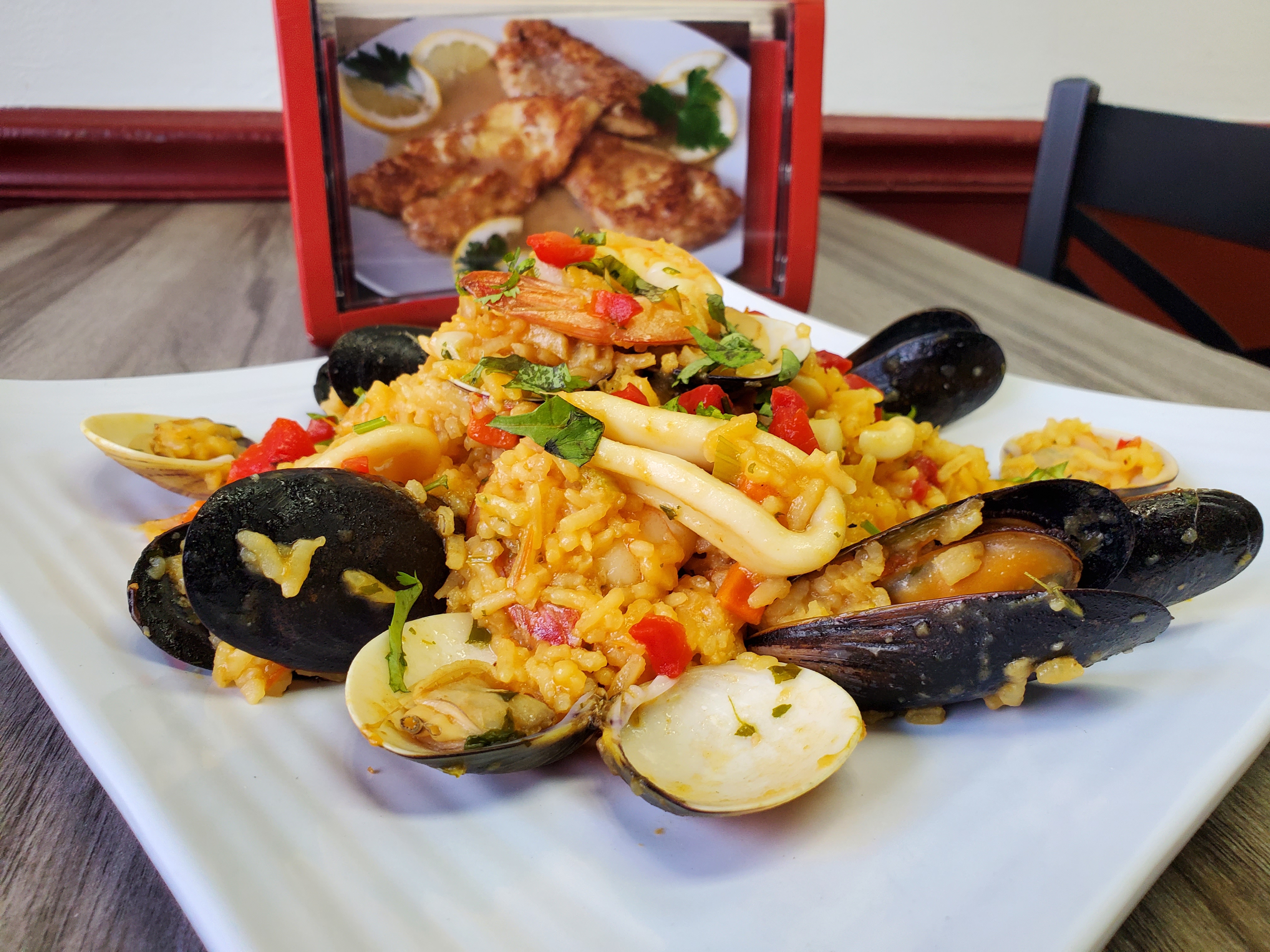 Order Paella seafood  food online from Calabria Pizza store, Shrub Oak on bringmethat.com