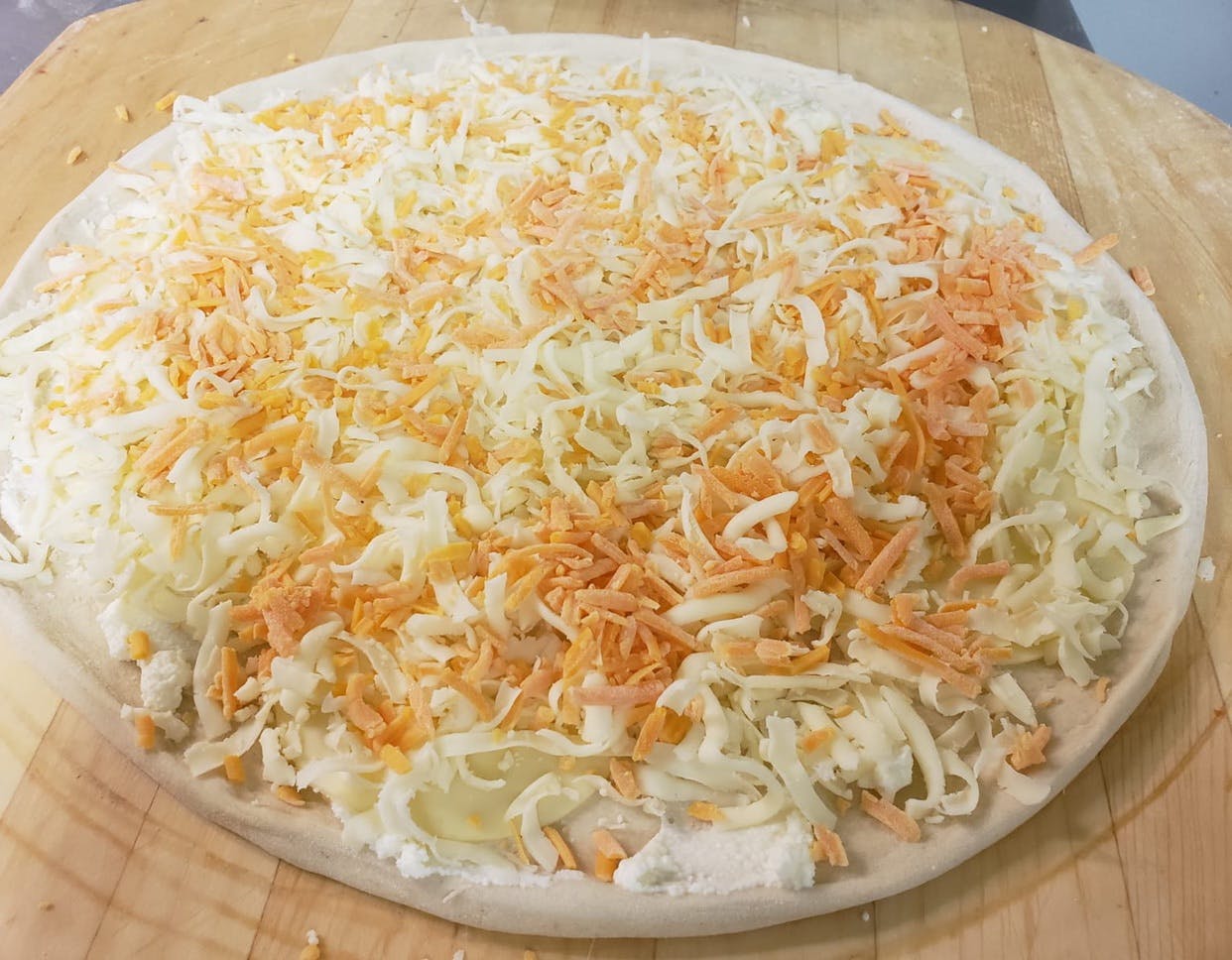 Order Four Cheese Pizza - Medium food online from Drake Pizza store, Allentown on bringmethat.com