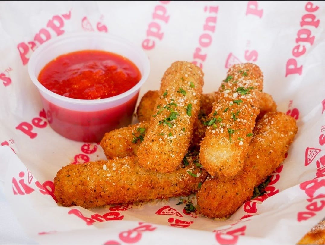 Order Breaded Mozzarella Sticks - 6 Pieces food online from Pepperoni's Pizza store, Rosenberg on bringmethat.com