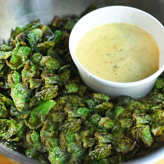Order Green Chile Queso Brussels food online from Hopdoddy Burger Bar store, Denver on bringmethat.com