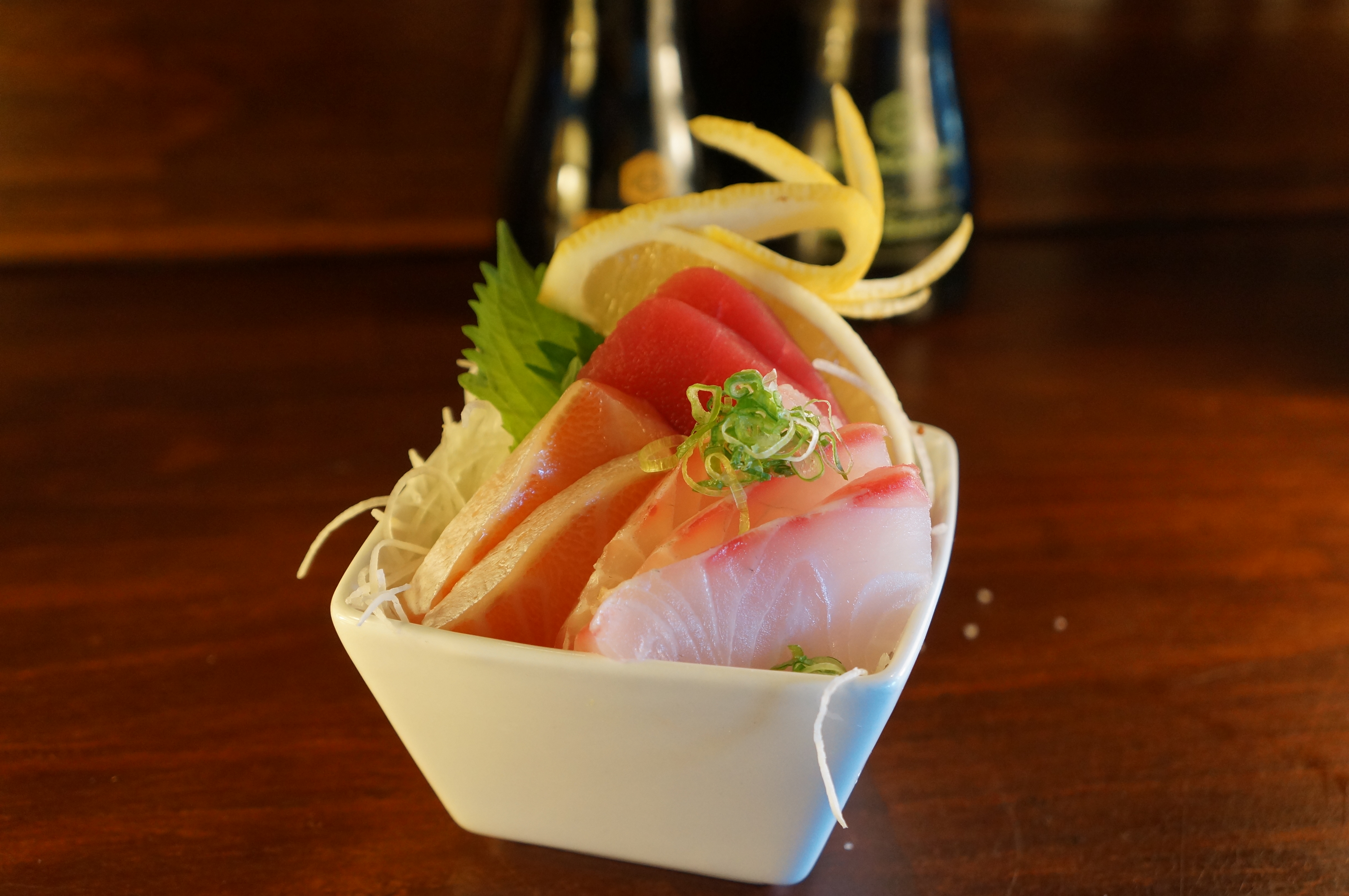 Order Mini Sashimi Platter food online from Tomo Sushi store, Laguna Woods on bringmethat.com