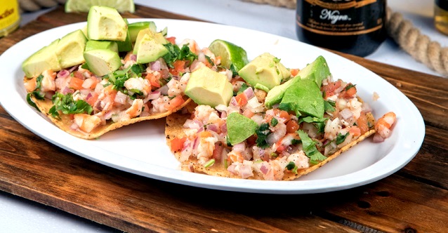 Order 2 Tostadas de Ceviche food online from Rodeo Mexican Grill store, Los Angeles on bringmethat.com