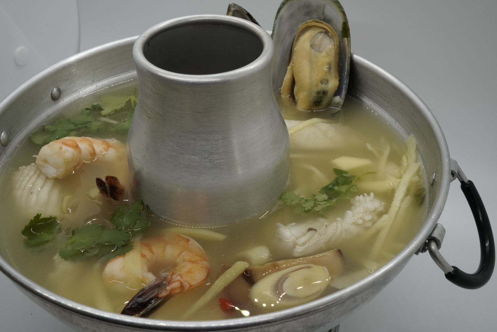 Order 23. Seafood Soup food online from Royal Orchid Thai II store, Riverside on bringmethat.com