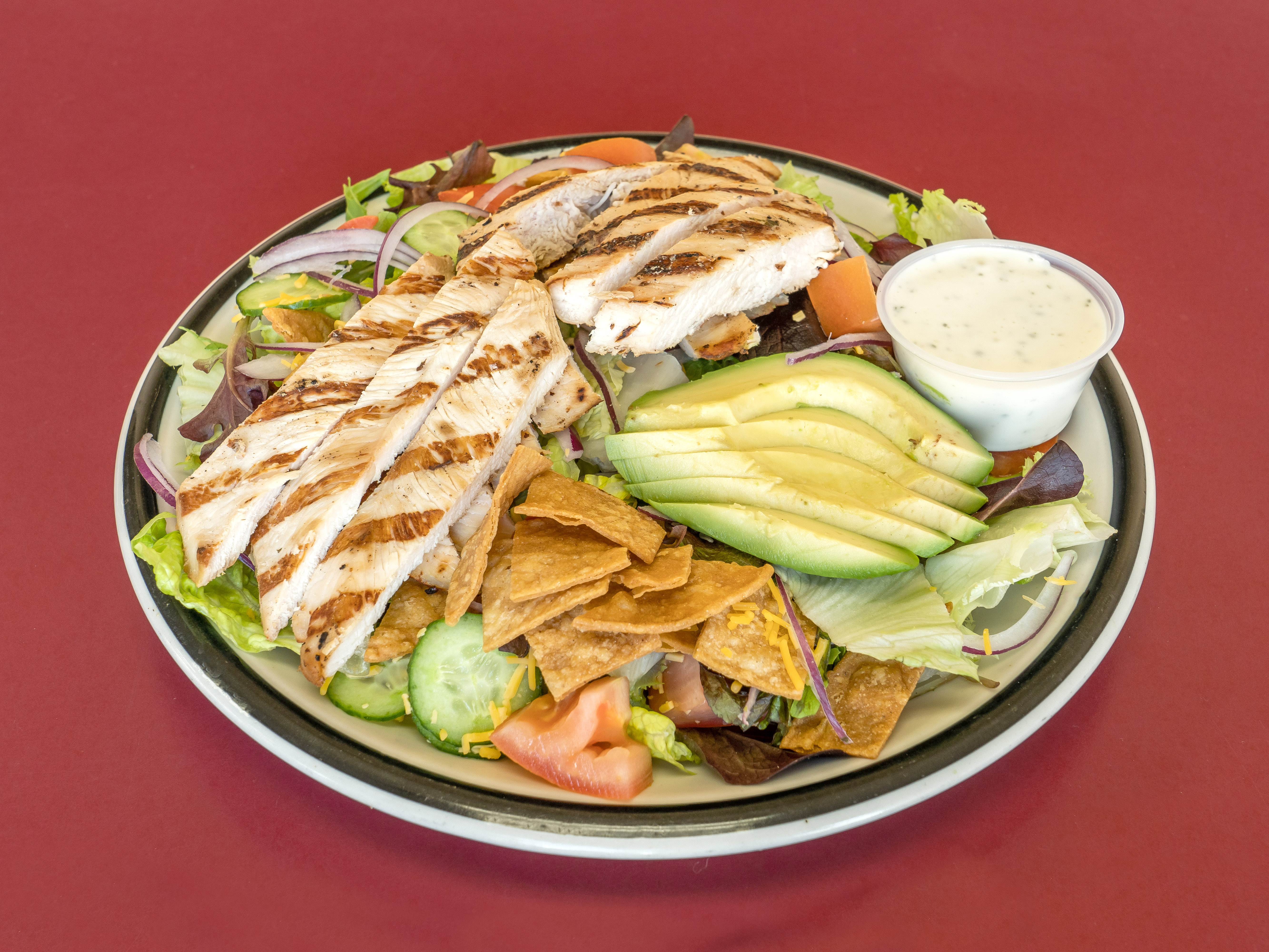 Order 27. Chicken Avocado Salad food online from Triquest Cafe store, Irvine on bringmethat.com