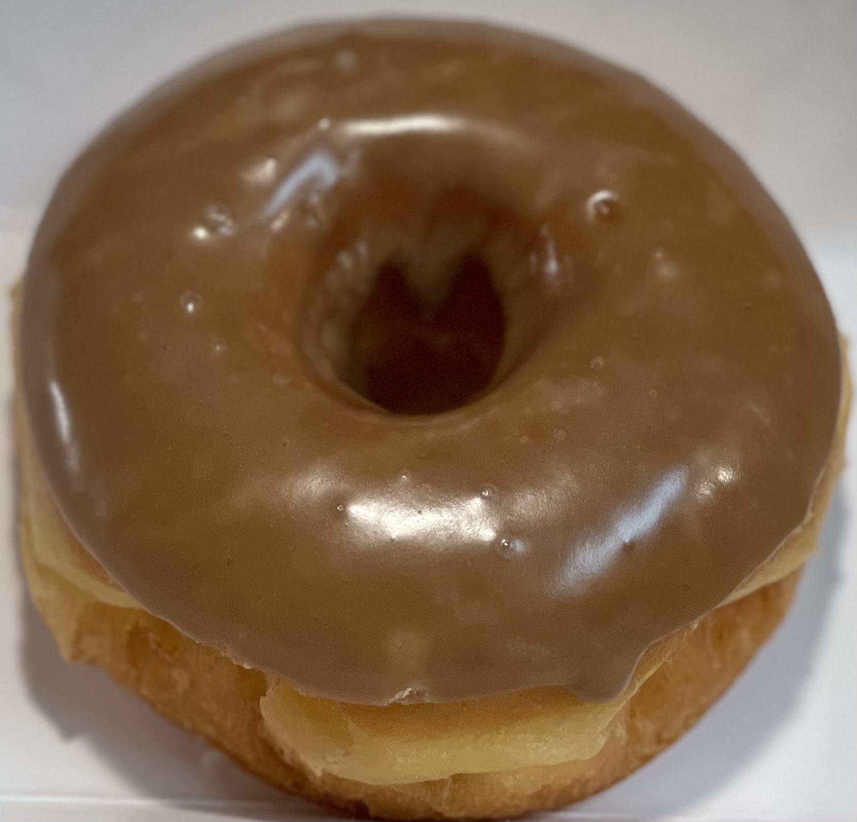 Order Raised Maple Donut food online from Glaze Donuts store, Ceres on bringmethat.com