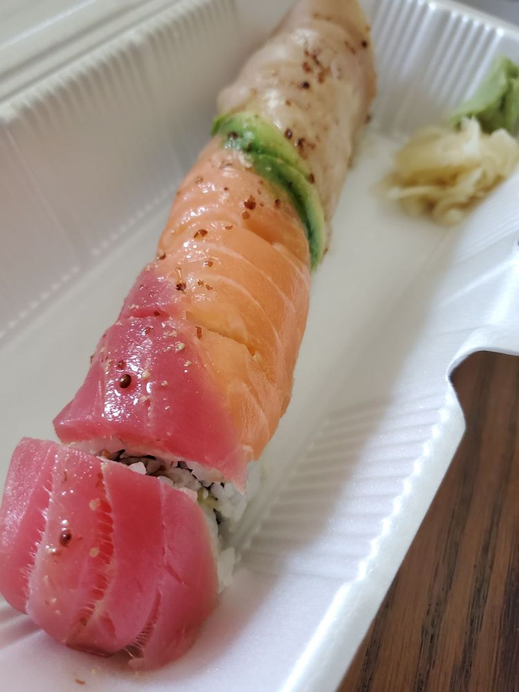Order Rainbow Roll food online from Mika Sushi store, Orange on bringmethat.com
