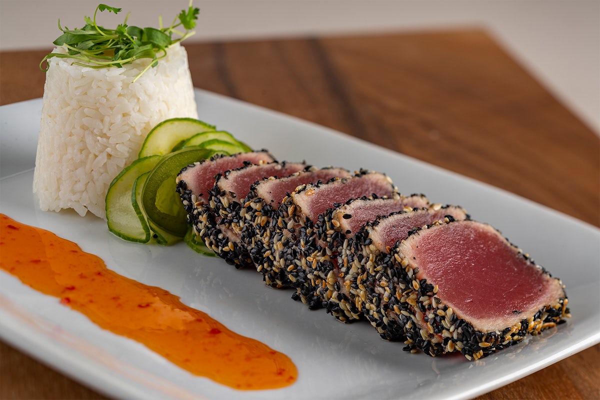 Order Sweet & Spicy Sesame Ahi Tuna* | GF food online from Perry Steakhouse & Grille store, Dallas on bringmethat.com