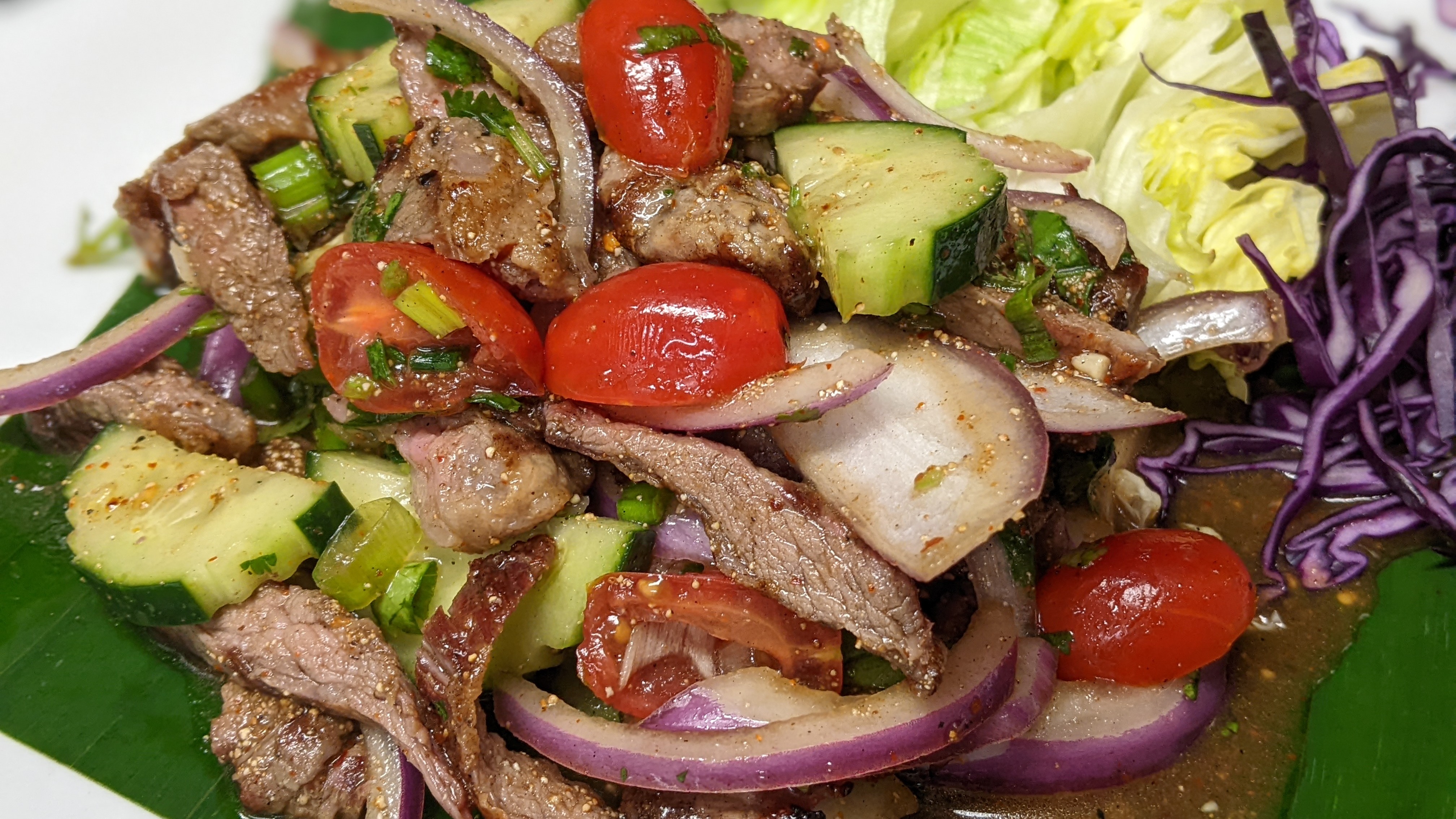 Order Yum Nua (Grilled Beef Salad) food online from Rice Pot Thai Cuisine store, New Haven on bringmethat.com