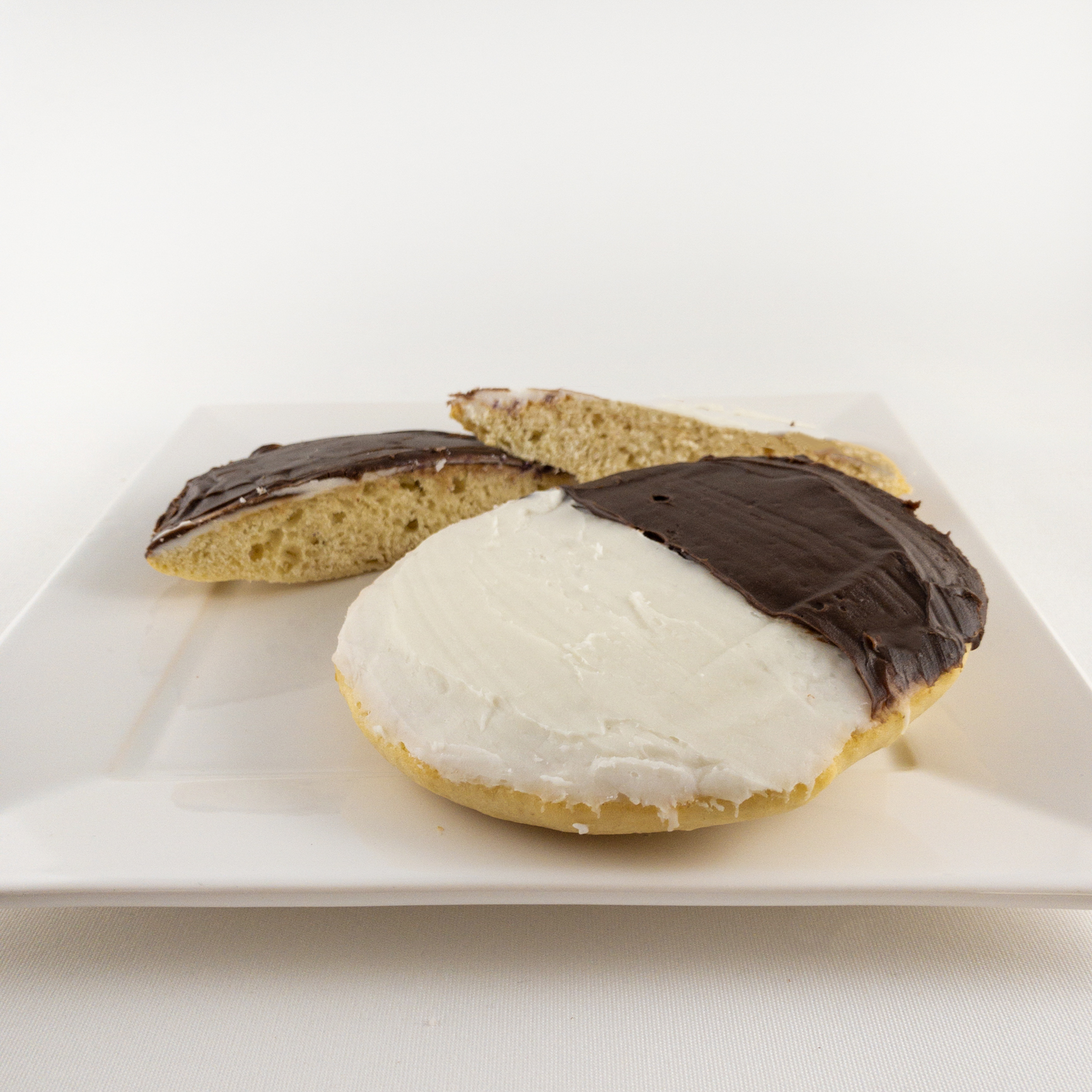 Order 2 Black and White Cookies food online from Rosenfeld Bagels store, Newton on bringmethat.com