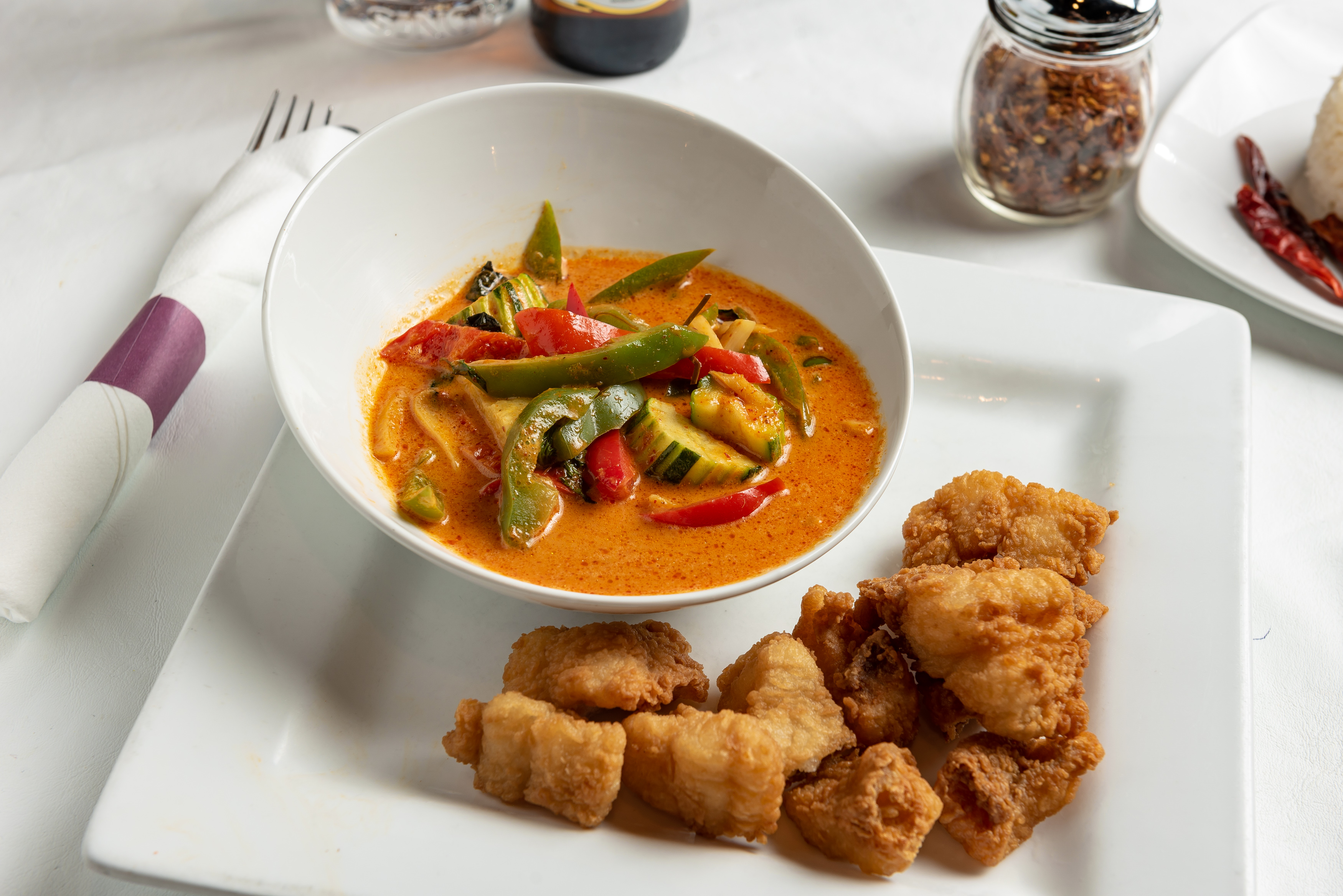 Order Spicy Catfish food online from Phuket Thai Restaurant and Sushi store, Huntsville on bringmethat.com