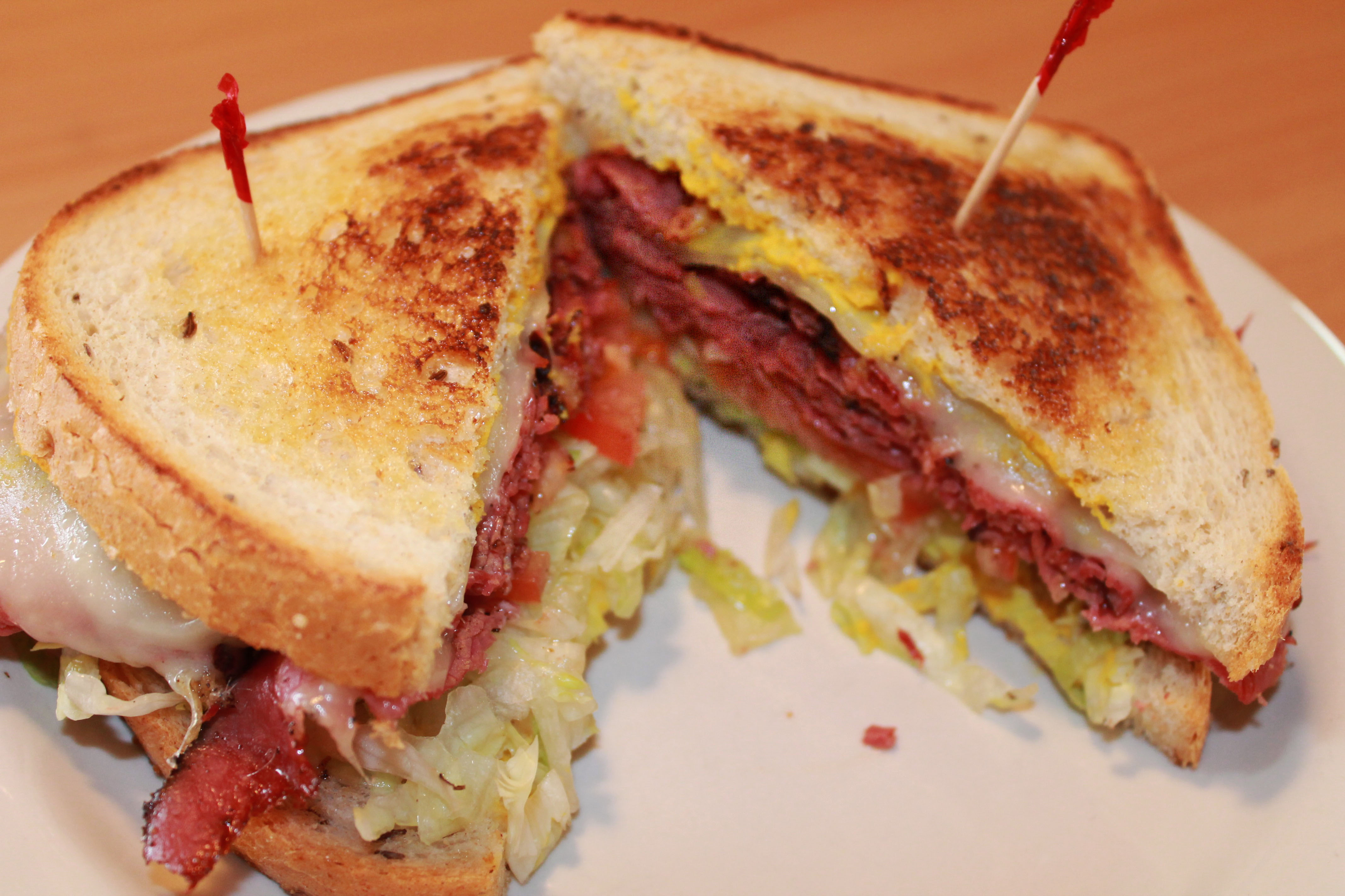 Order Pastrami Sandwich  food online from Pecan St. Station Deli And Grill store, Pflugerville on bringmethat.com